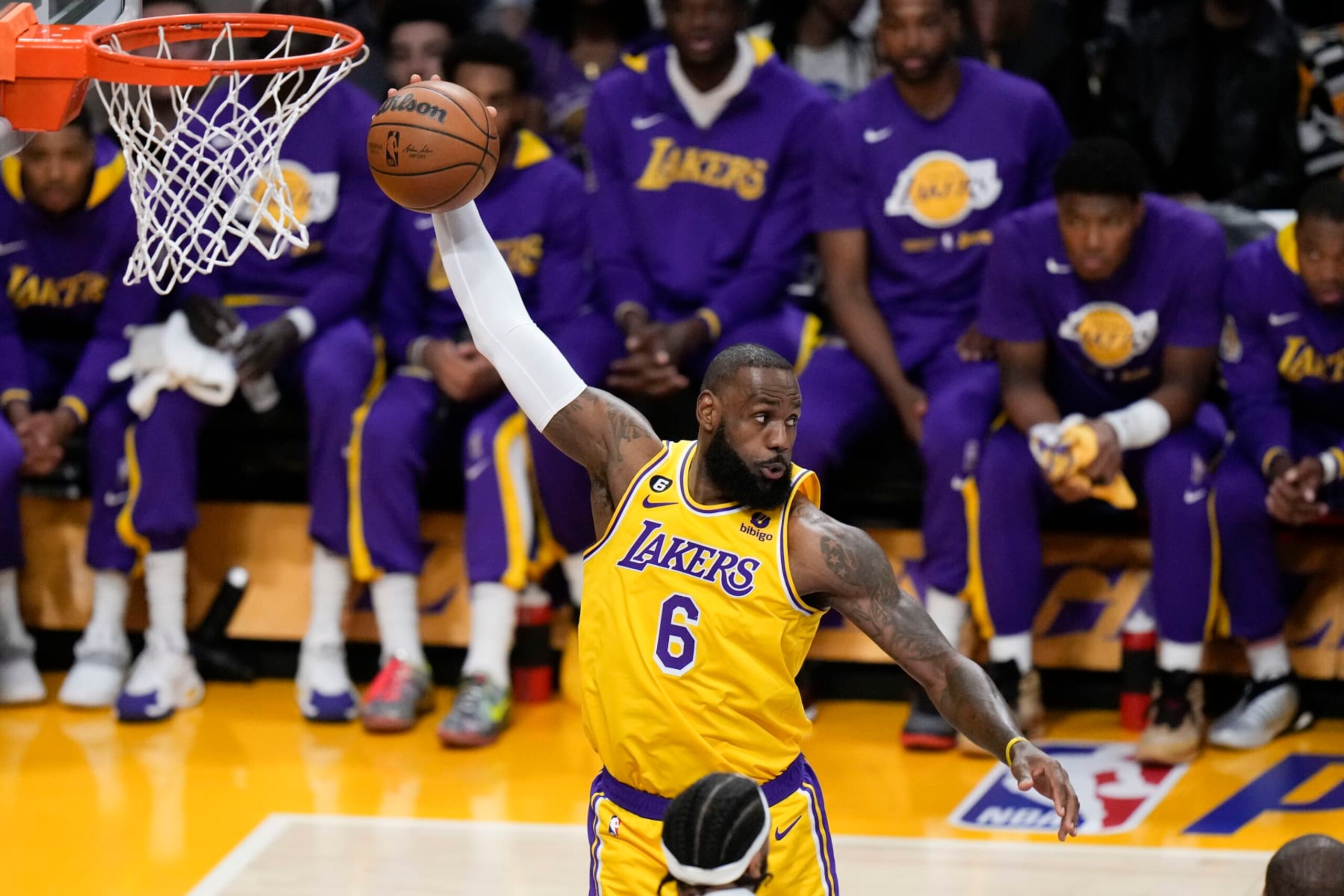 Los Angeles Lakers' LeBron James grabs a rebound during the first half in Game 6 of the team's first-round NBA basketball playoff series against the Memphis Grizzlies on Friday, April 28, 2023, in Los Angeles. (AP Photo/Jae C. Hong)