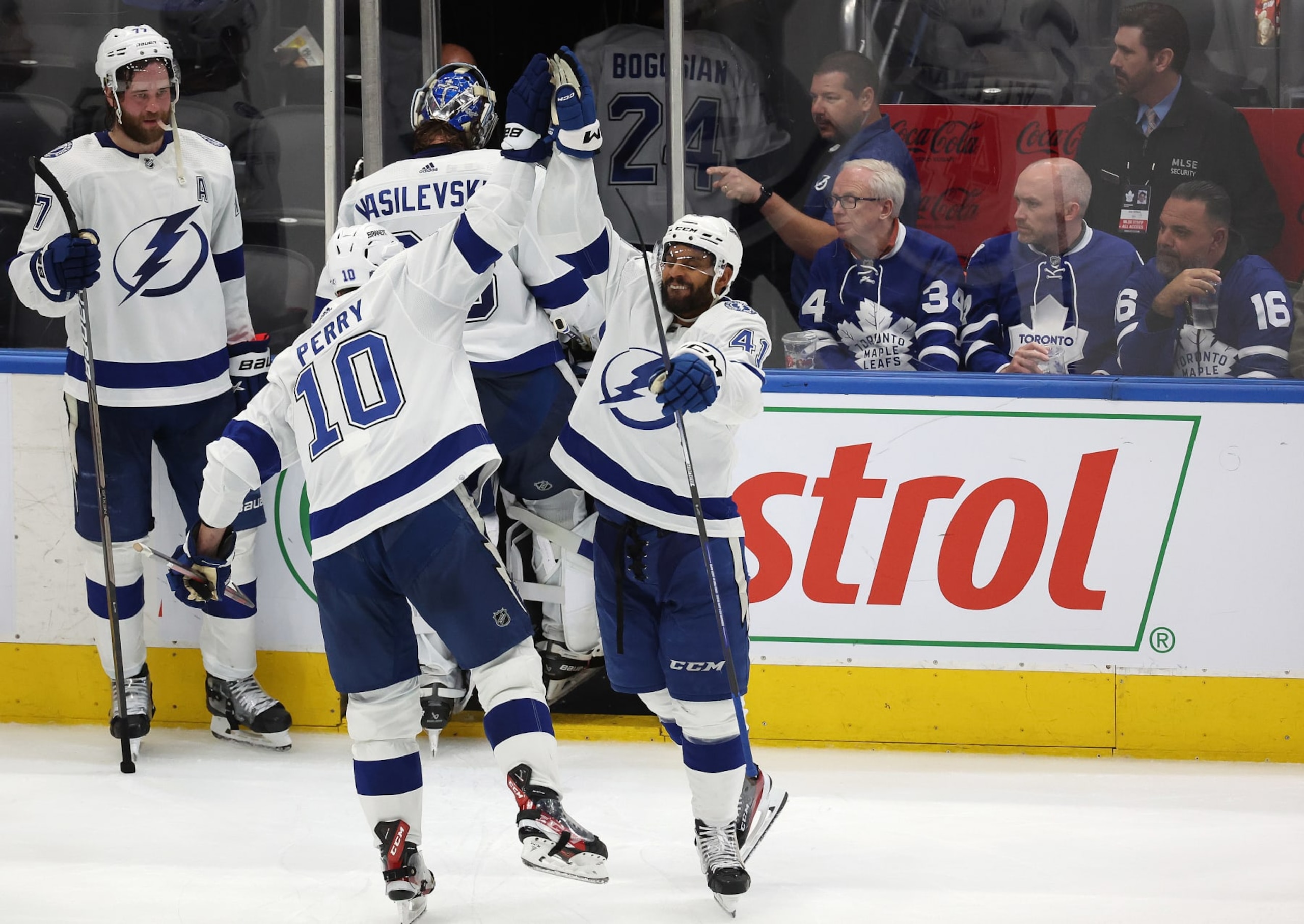 TORONTO, ON- APRIL 27  - Tampa Bay Lightning right wing Corey Perry (10) high fives Tampa Bay Lightning left wing Pierre-Edouard Bellemare (41) at the end of the game as the Toronto Maple Leafs fall to the Tampa Bay Lightning 4-2 in game five of their first round NHL playoffs series  at Scotiabank Arena in Toronto. April 27, 2023.        (Steve Russell/Toronto Star via Getty Images)
