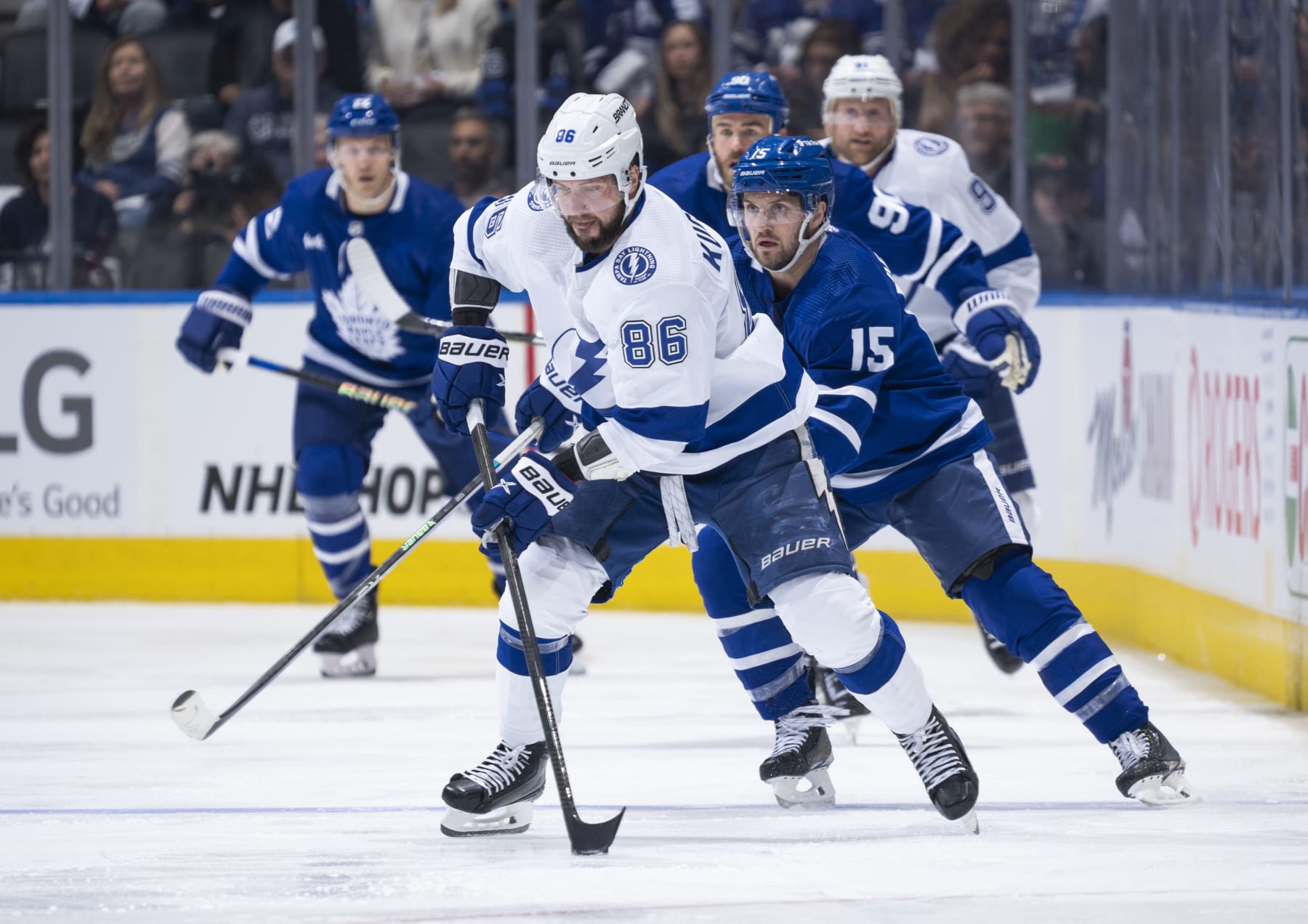 TORONTO, ON - APRIL 27: Nikita Kucherov #86 of the Tampa Bay Lightning skates against Alexander Kerfoot #15 of the Toronto Maple Leafs during the first period in Game Five of the First Round of the 2023 Stanley Cup Playoffs at the Scotiabank Arena on April 27, 2023 in Toronto, Ontario, Canada. (Photo by Mark Blinch/NHLI via Getty Images)