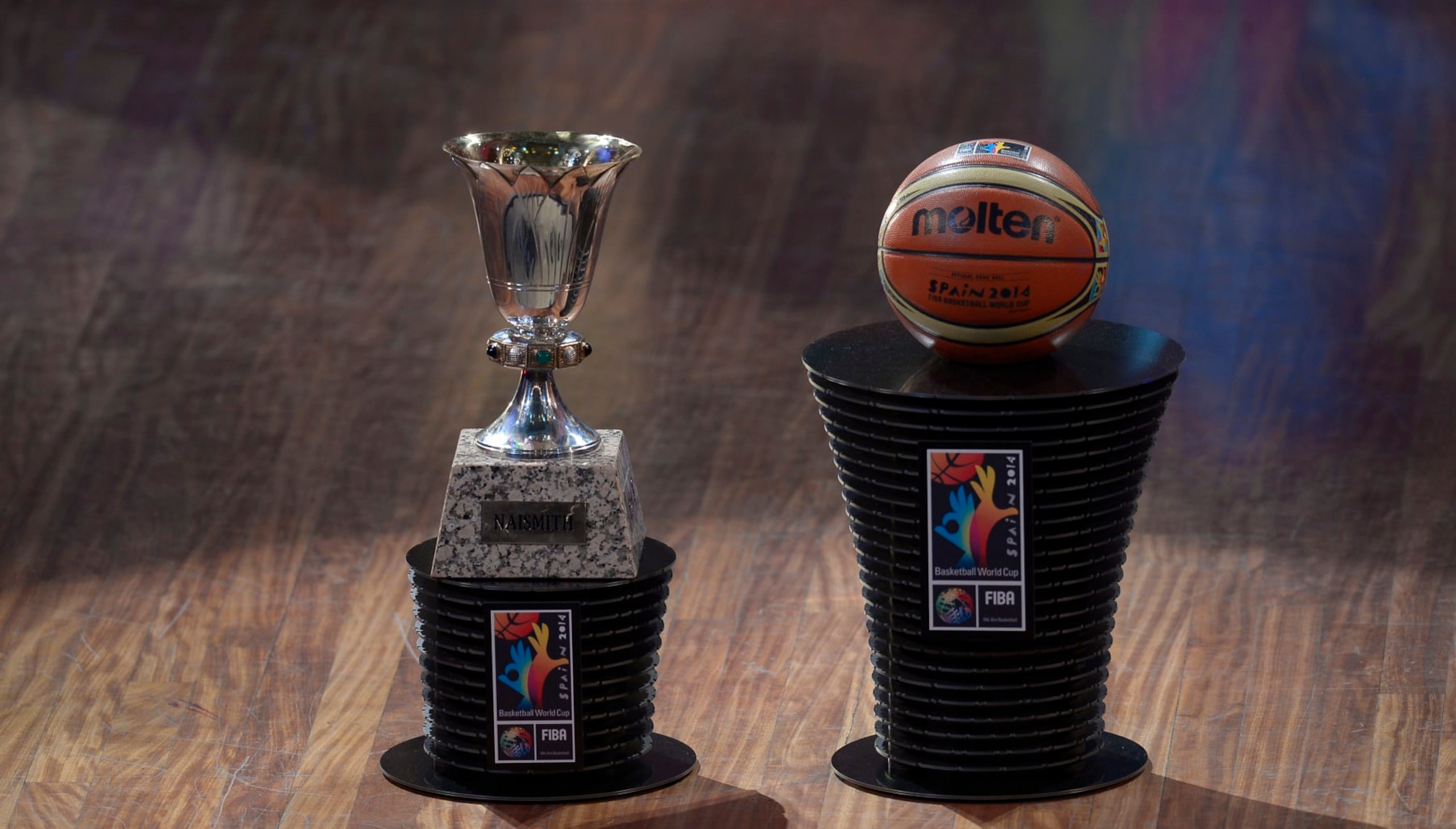 A basketball and a Naismith trophy are displayed during the FIBA Basketball World Cup official draw for the 2014 world cup, at the Palau de la Musica in Barcelona, Spain, Monday, Feb. 3, 2014. The competition will take place from 30 August to 14 September in Spain. (AP Photo/Manu Fernandez) A basketball and a Naismith trophy are displayed during the FIBA Basketball World Cup official draw for the 2014 world cup, at the Palau de la Musica in Barcelona, Spain, Monday, Feb. 3, 2014. The competition will take place from 30 August to 14 September in Spain. (AP Photo/Manu Fernandez)