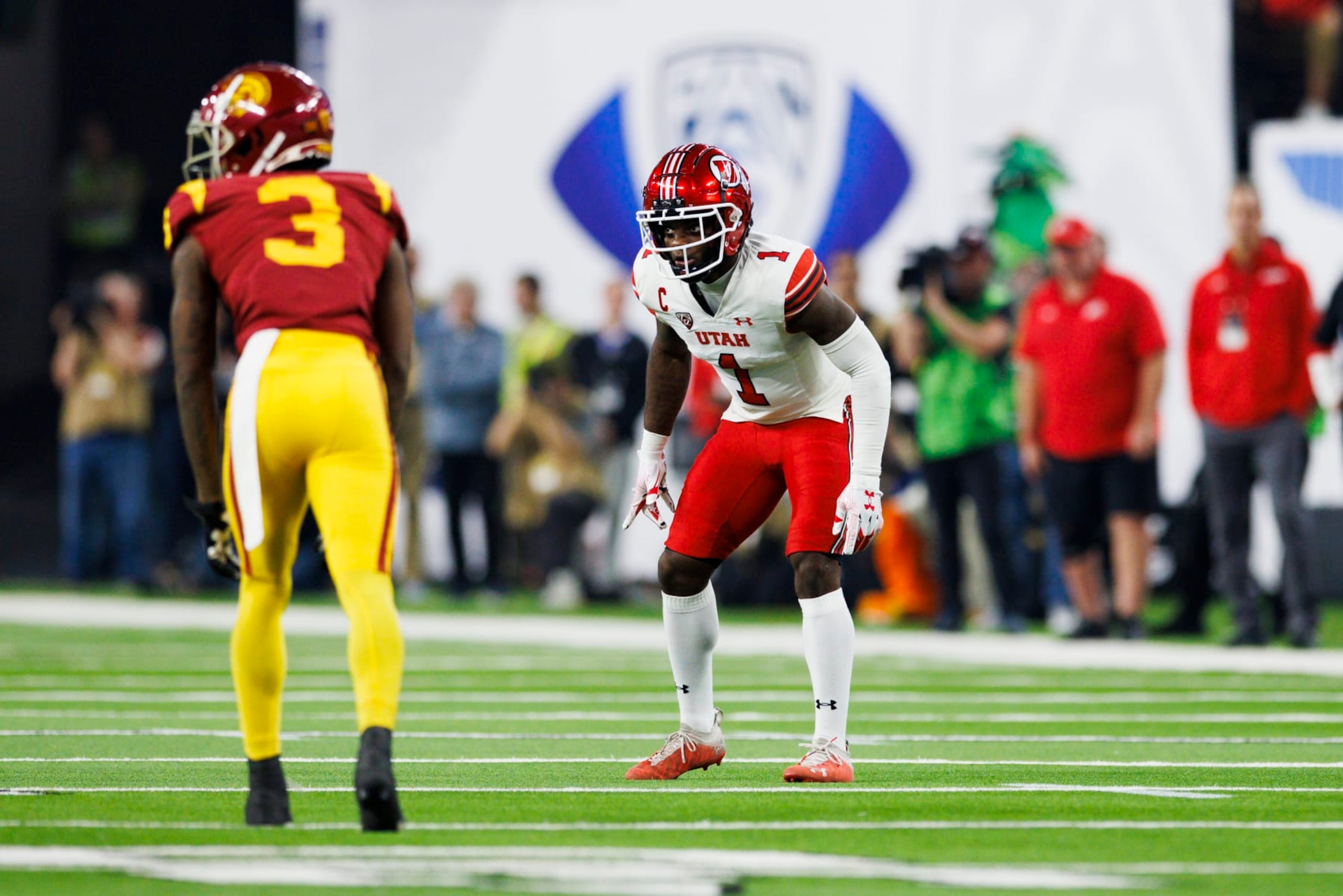 LAS VEGAS, NV - DECEMBER 02: Utah Utes cornerback Clark Phillips III (1) covers USC Trojans wide receiver Jordan Addison (3) during the Pac-12 Championship football game on December 2, 2022 at Allegiant Stadium in Las Vegas, NV. (Photo by Ric Tapia/Icon Sportswire via Getty Images)