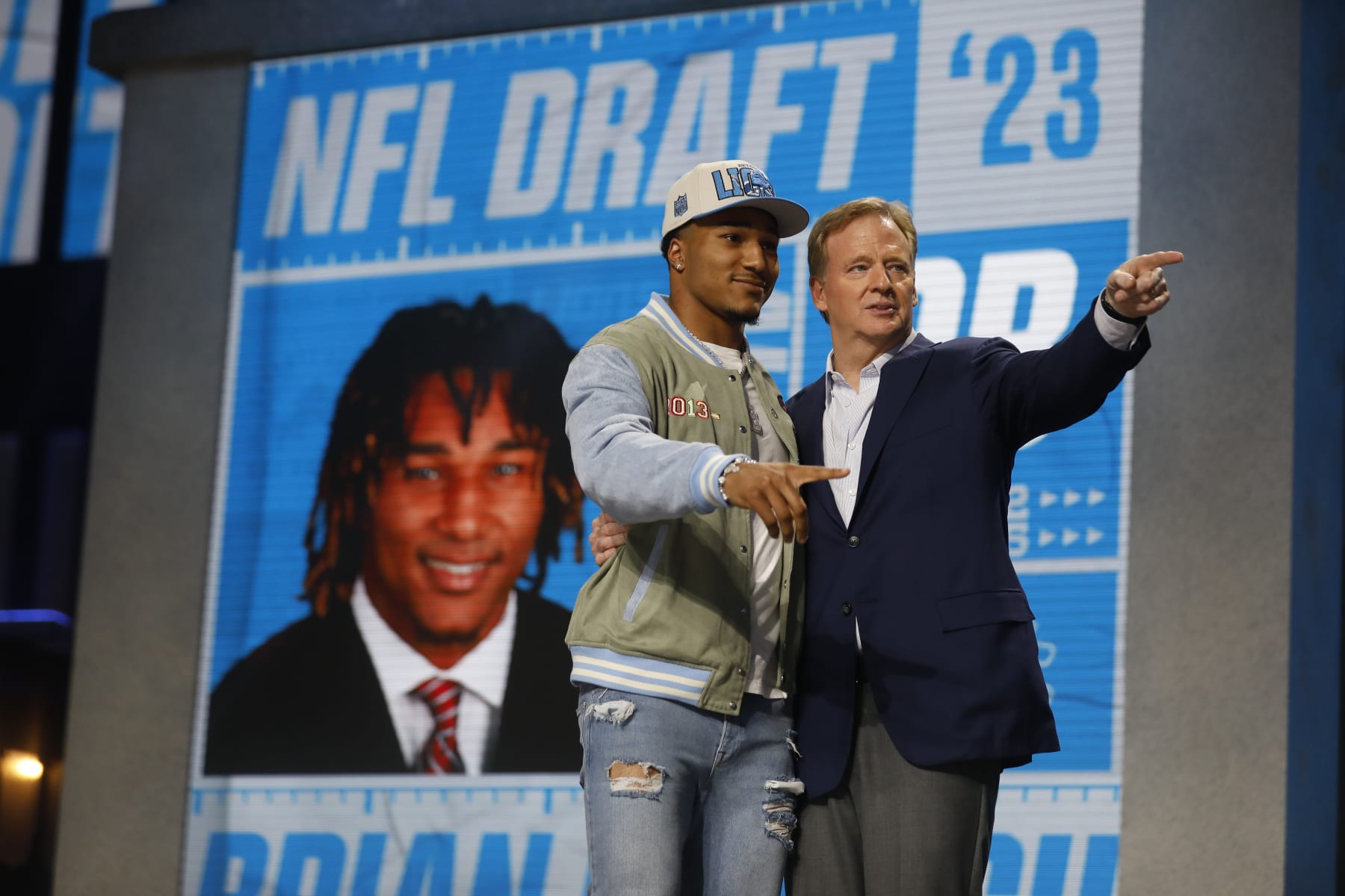 KANSAS CITY, MO - APRIL 28: NFL Commissioner Roger Goodell speaks with Brian Branch, selected by the Detroit Lions in the second round of the 2023 NFL Draft at Union Station on April 28, 2023 in Kansas City, Missouri. (Photo by David Eulitt/Getty Images)