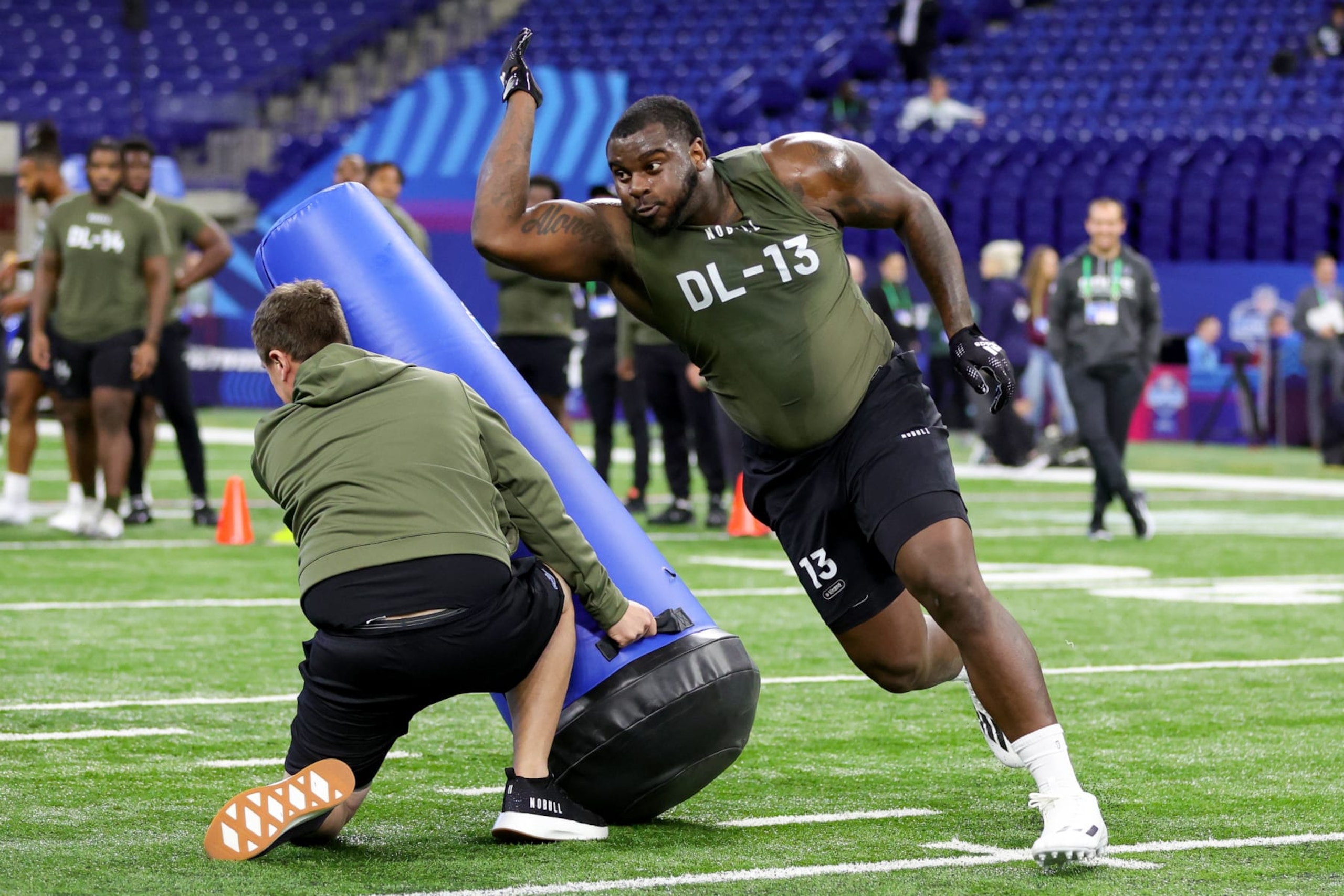 INDIANAPOLIS, INDIANA - MARCH 02: Defensive lineman Jalen Redmond of Oklahoma participates in a drill during the NFL Combine at Lucas Oil Stadium on March 02, 2023 in Indianapolis, Indiana. (Photo by Stacy Revere/Getty Images)
