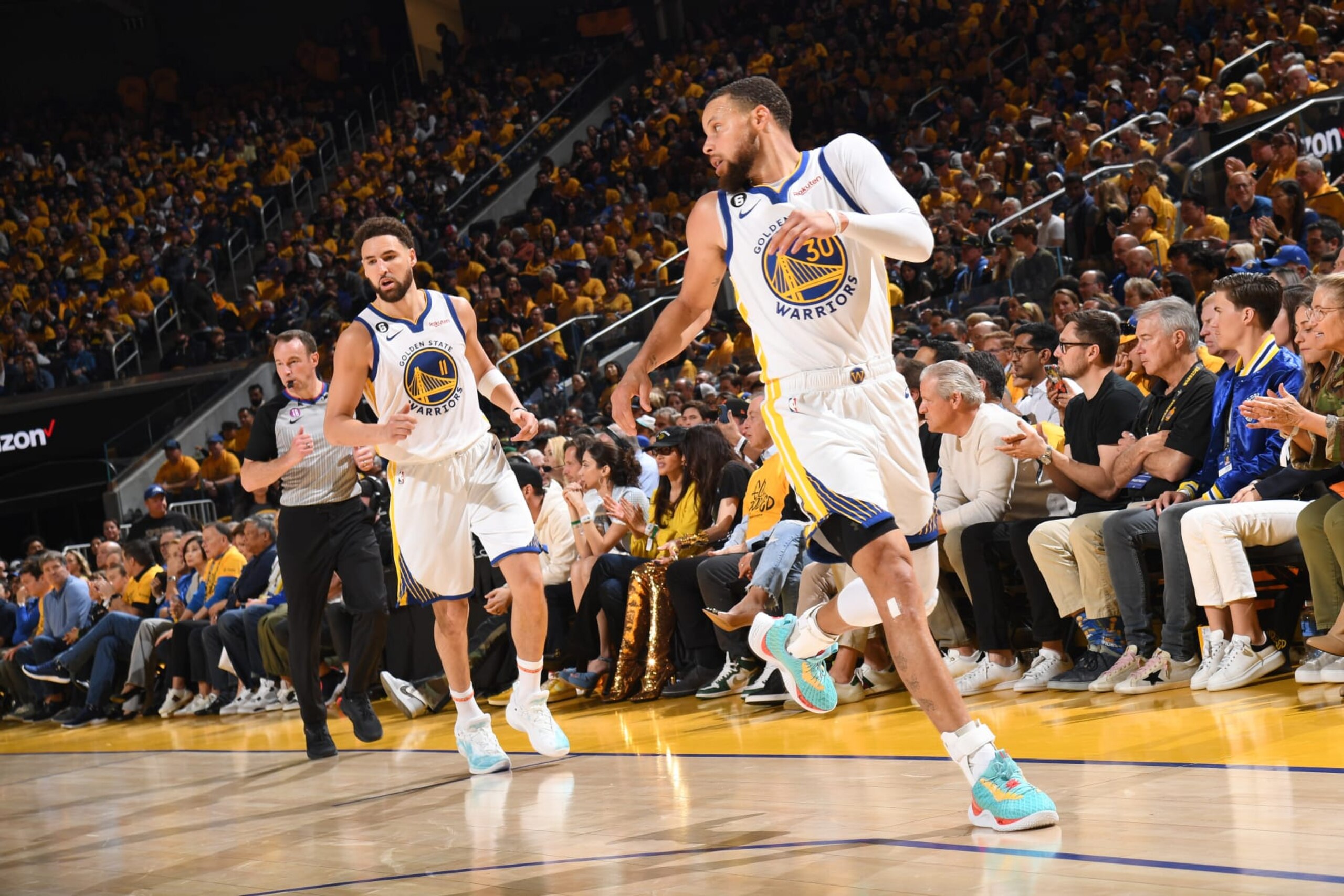 SAN FRANCISCO, CA - APRIL 23: Klay Thompson #11 and Stephen Curry #30 of the Golden State Warriors look on during the game against the Sacramento Kings during Round One Game Four of the 2023 NBA Playoffs on April 23, 2023 at Chase Center in San Francisco, California. NOTE TO USER: User expressly acknowledges and agrees that, by downloading and or using this photograph, user is consenting to the terms and conditions of Getty Images License Agreement. Mandatory Copyright Notice: Copyright 2023 NBAE (Photo by Noah Graham/NBAE via Getty Images)
