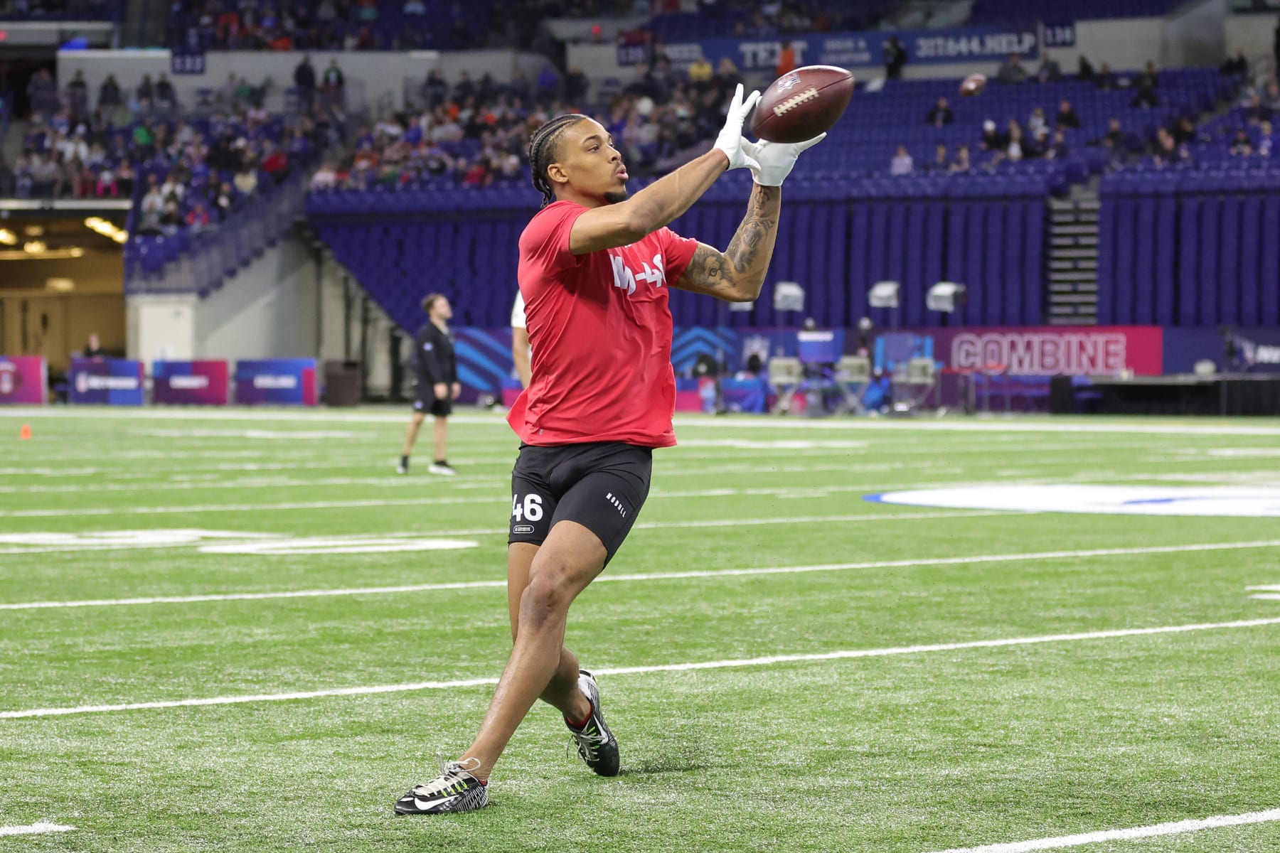 INDIANAPOLIS, INDIANA - MARCH 04: Cedric Tillman of Tennessee participates in a drill during the NFL Combine at Lucas Oil Stadium on March 04, 2023 in Indianapolis, Indiana. (Photo by Stacy Revere/Getty Images)