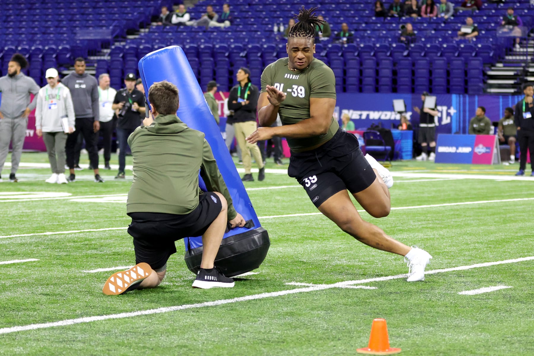 INDIANAPOLIS, INDIANA - MARCH 02: Defensive lineman Isaiah Mcguire of Missouri participates in a drill during the NFL Combine at Lucas Oil Stadium on March 02, 2023 in Indianapolis, Indiana. (Photo by Stacy Revere/Getty Images)