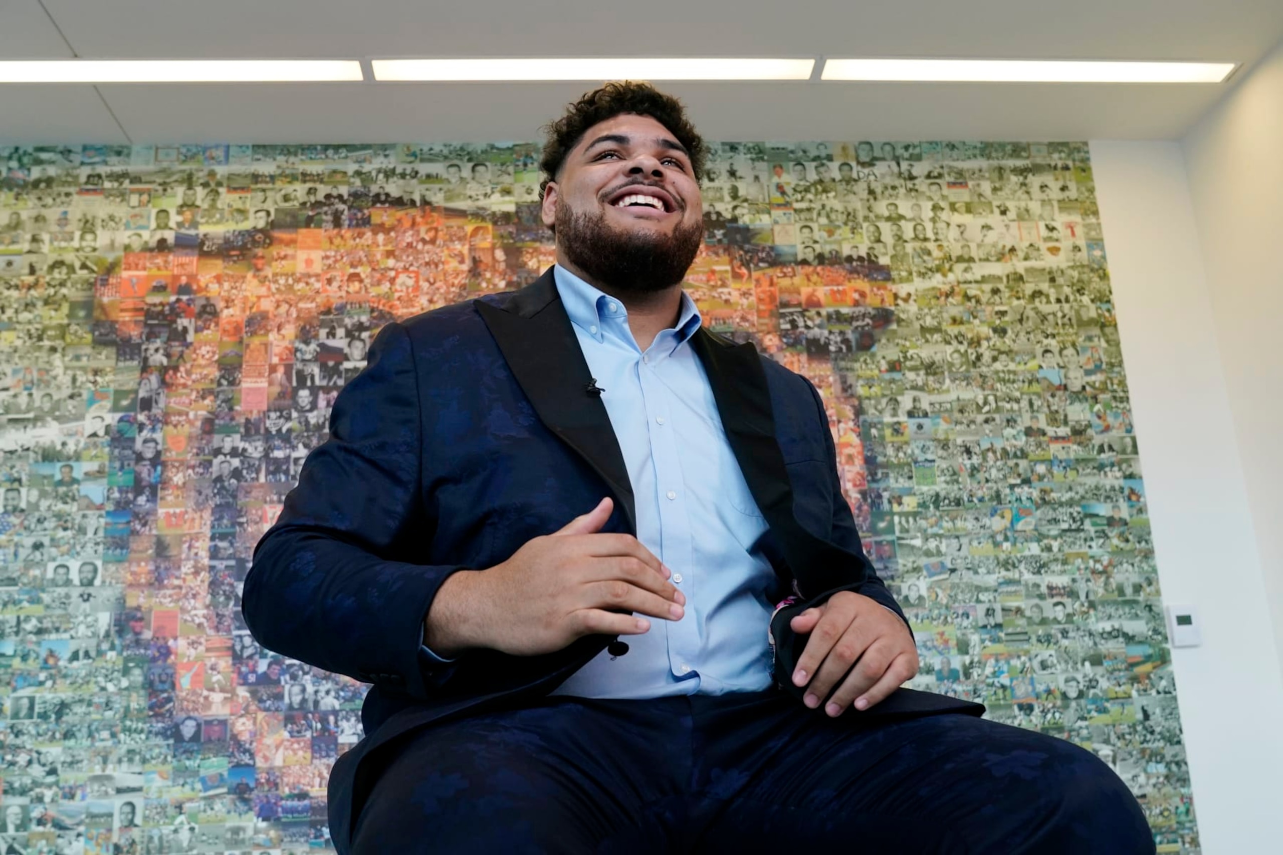 Chicago Bears number one draft pick offensive lineman Darnell Wright waits for an interview after news conference at Halas Hall in Lake Forest, Ill., Friday, April 28, 2023. The Chicago Bears selected offensive lineman Darnell Wright with the 10th overall pick in the first round of the 2023 NFL Draft on Thursday evening. The Bears acquired the 10th overall selection after completing a pair of trades with the Carolina Panthers on March 15, and the Philadelphia Eagles on Thursday night. (AP Photo/Nam Y. Huh)