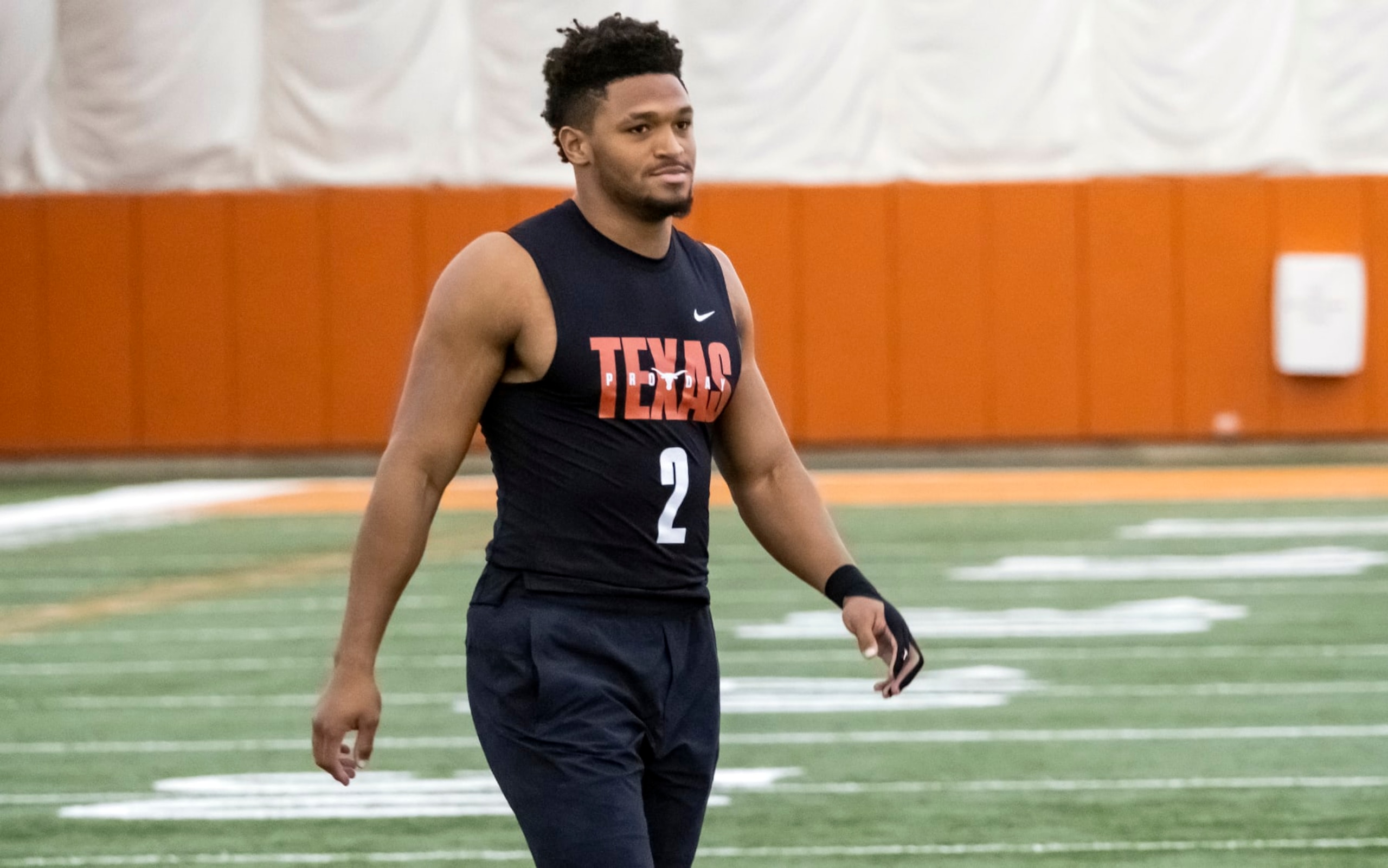 Texas running back Roschon Johnson prepares to workout during Texas Pro Day, on Thursday, March 9, 2023, in Austin, Texas. (AP Photo/Rodolfo Gonzalez)