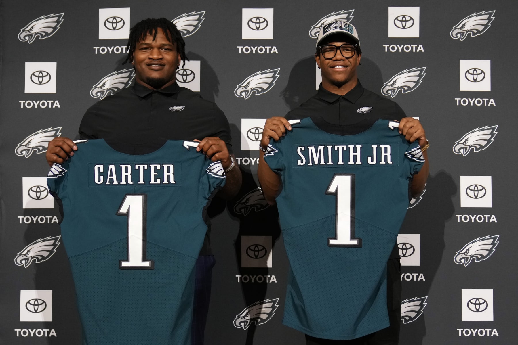 Newly drafted Philadelphia Eagles' Jalen Carter, left, and Nolan Smith pose for a photo after a news conference at the NFL football team's training facility, Friday, April 28, 2023, in Philadelphia. (AP Photo/Matt Slocum)