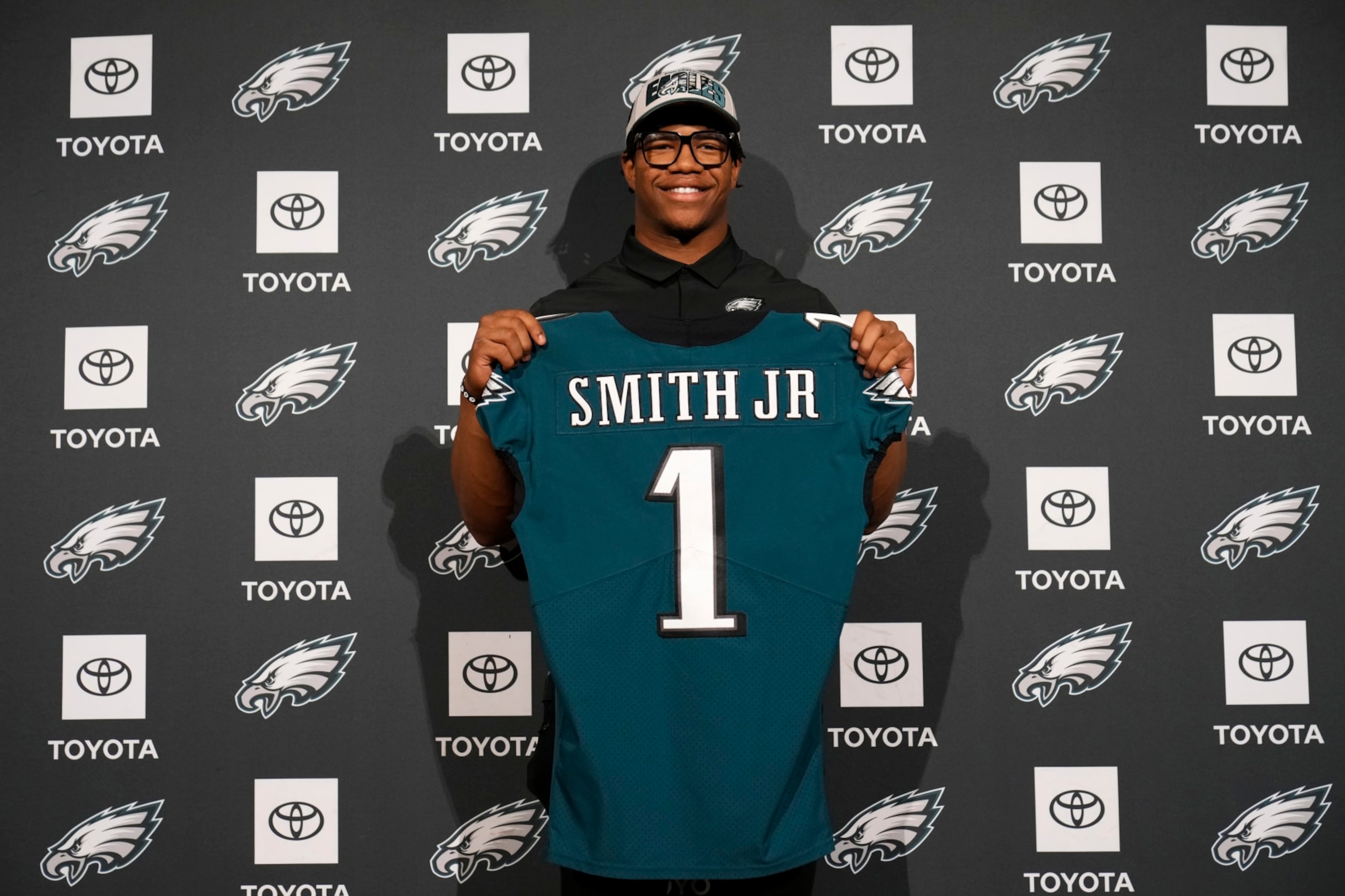 Newly drafted Nolan Smith poses for a photo after a news conference at the NFL football team's training facility, Friday, April 28, 2023, in Philadelphia. (AP Photo/Matt Slocum)