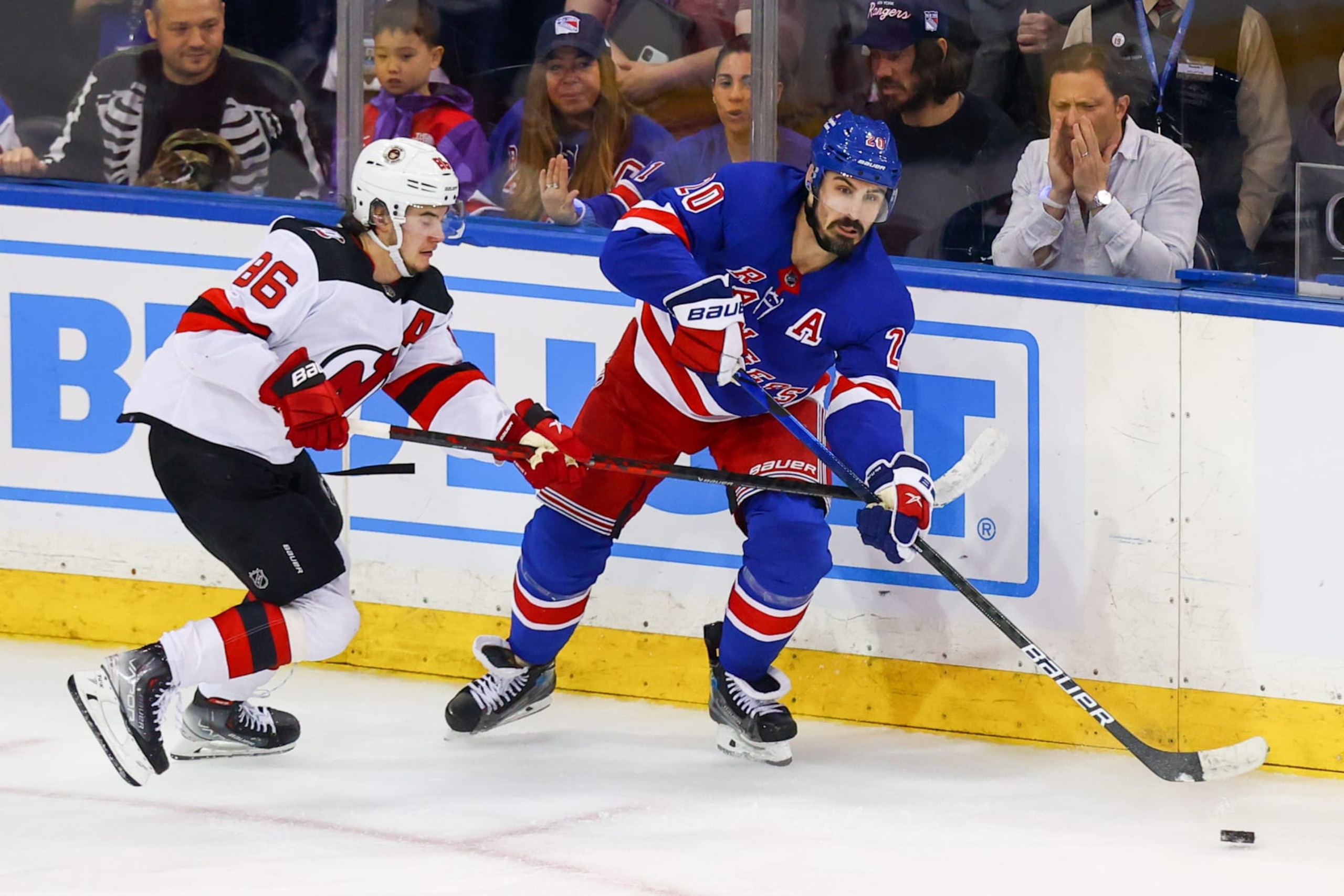 NEW YORK, NY - APRIL 29:New York Rangers Left Wing Chris Kreider (20) skates against New Jersey Devils Center Jack Hughes (86) during the third period of Game 6 of the National Hockey League Eastern Conference First Round between the New Jersey Devils and the New York Rangers on April 29, 2023 at Madison Square Garden in New York, NY. (Photo by Joshua Sarner/Icon Sportswire via Getty Images)