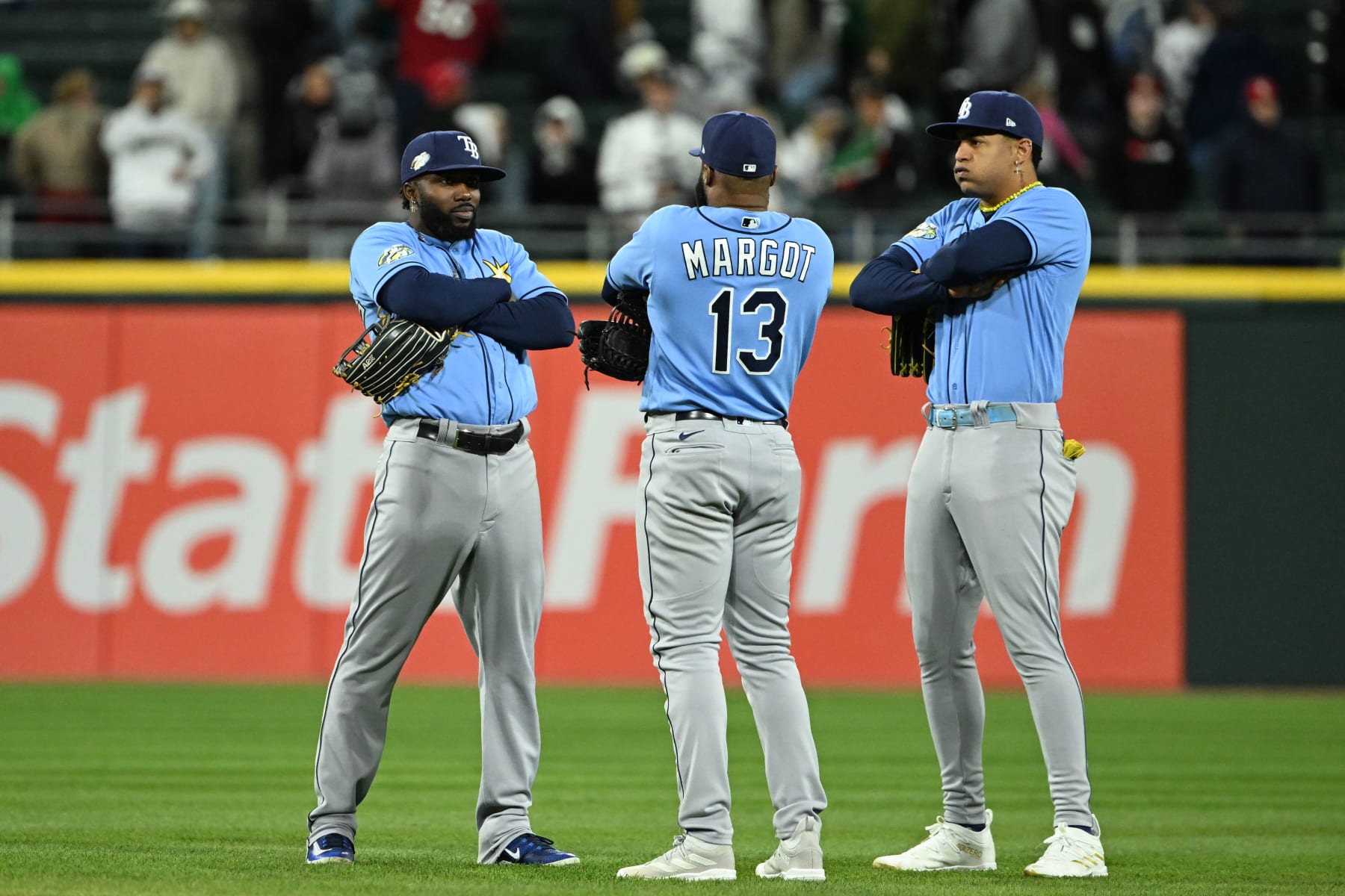 CHICAGO, ILLINOIS - APRIL 29: Randy Arozarena #56, Manuel Margot #13 and Jose Siri #22 of the Tampa Bay Rays celebrate after defeating Chicago White Sox 12-3 at Guaranteed Rate Field on April 29, 2023 in Chicago, Illinois. (Photo by Quinn Harris/Getty Images)