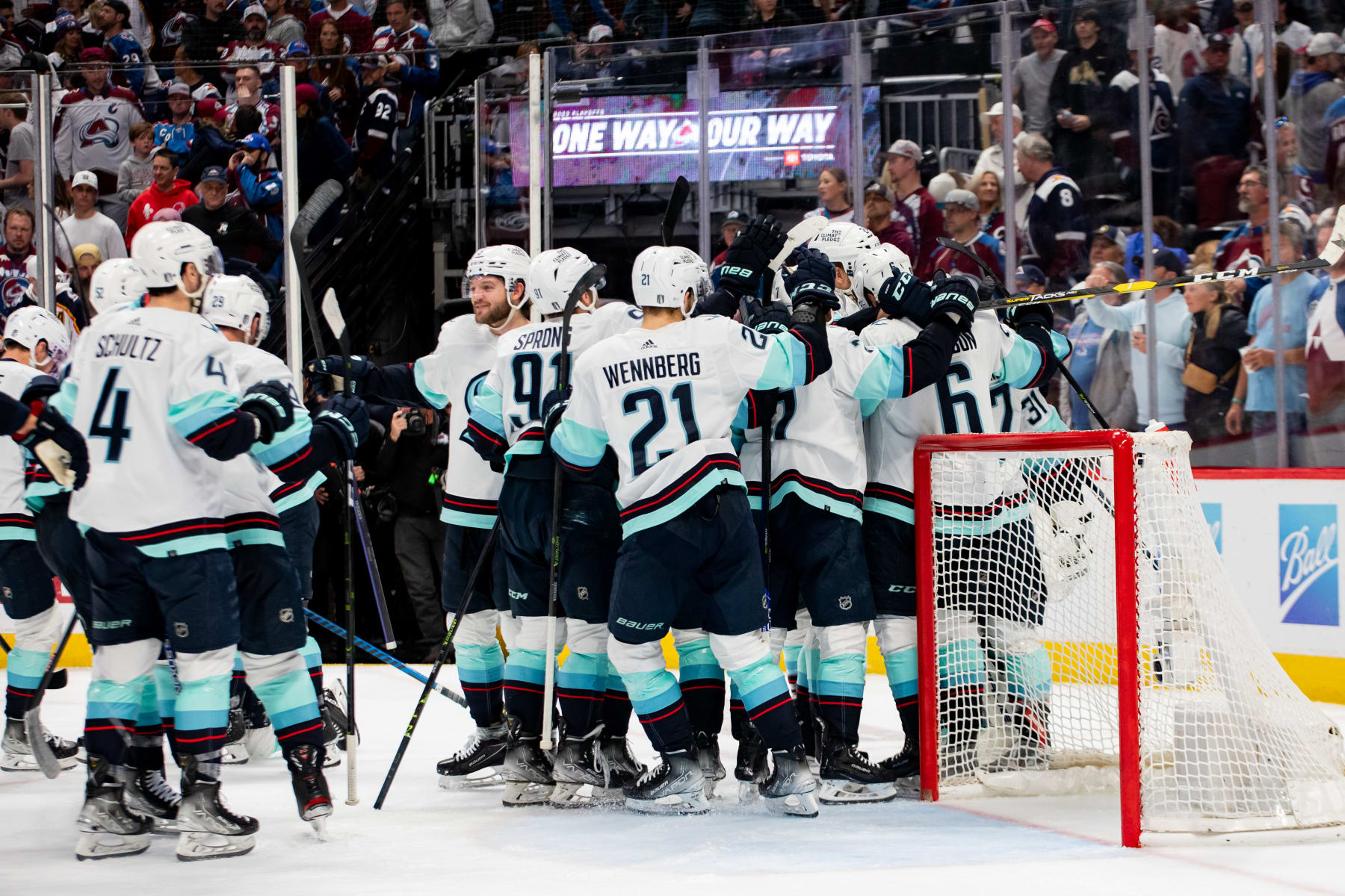 DENVER, COLORADO - APRIL 30: The Seattle Kraken swarm goaltender Philipp Grubauer after the Kraken defeated the Colorado Avalanche 2-1 in Game Seven of the First Round of the 2023 Stanley Cup Playoffs at Ball Arena on April 30, 2023 in Denver, Colorado. (Photo by Ashley Potts/NHLI via Getty Images)