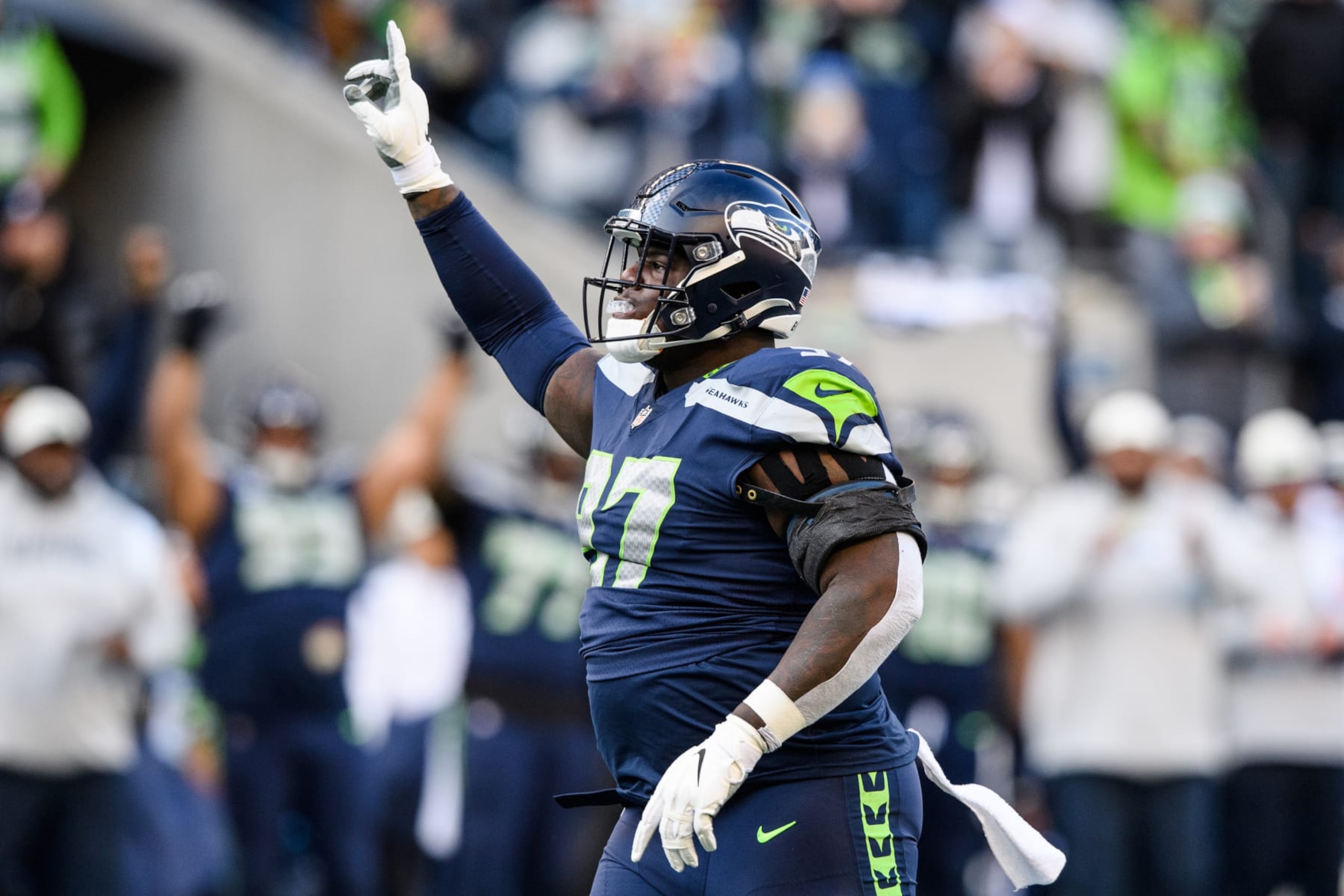 SEATTLE, WASHINGTON - NOVEMBER 27: Poona Ford #97 of the Seattle Seahawks reacts during the second quarter of the game against the Seattle Seahawks at Lumen Field on November 27, 2022 in Seattle, Washington. (Photo by Jane Gershovich/Getty Images)
