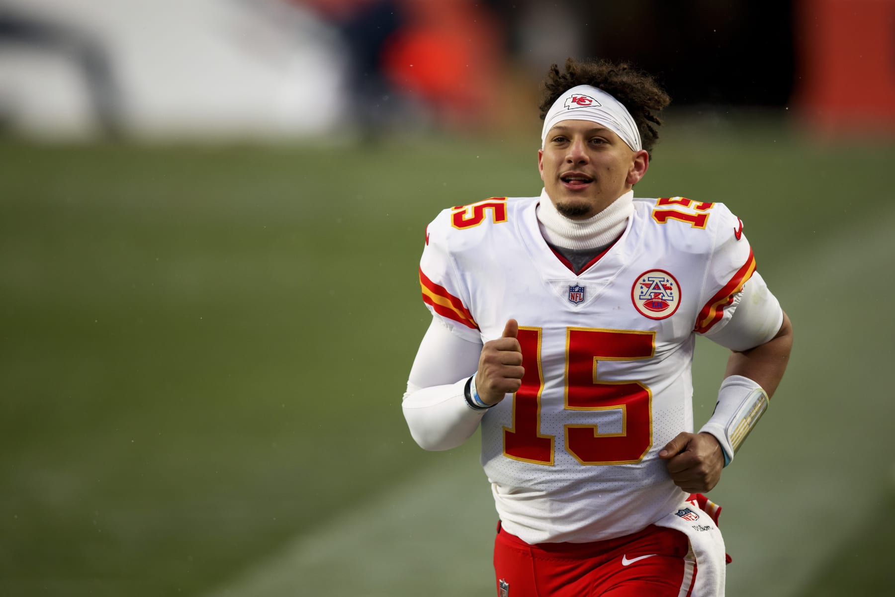 Kansas City Chiefs quarterback Patrick Mahomes (15) smiles as he runs off the field after defeating the Denver Broncos in 43-16 in an NFL football game, Sunday, Oct.. 25, 2020, in Denver. (AP Photo/Justin Edmonds)
