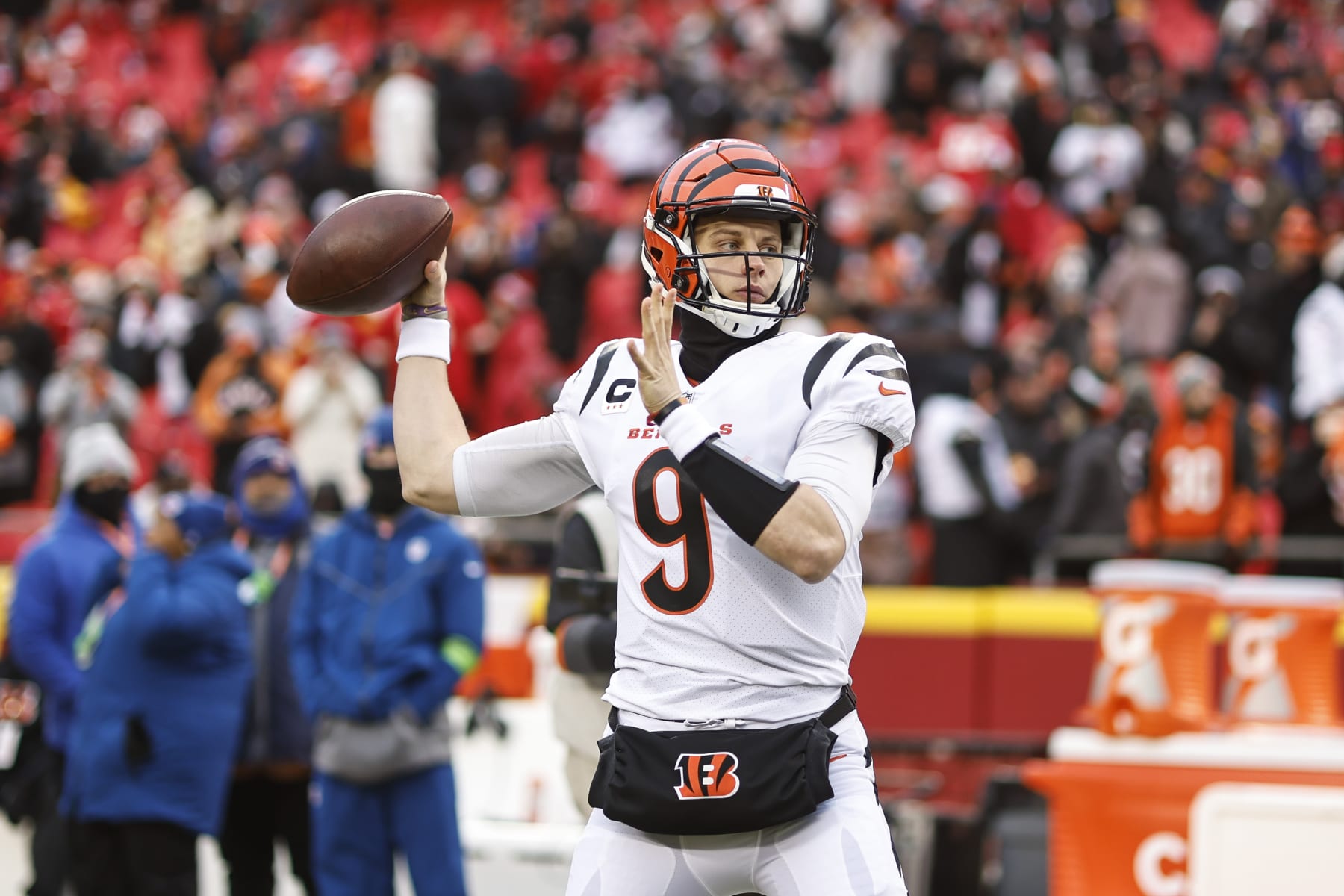 KANSAS CITY, MISSOURI - JANUARY 29: Joe Burrow #9 of the Cincinnati Bengals passes as he warms up prior to the AFC Championship NFL football game between the Kansas City Chiefs and the Cincinnati Bengals at GEHA Field at Arrowhead Stadium on January 29, 2023 in Kansas City, Missouri. (Photo by Michael Owens/Getty Images)