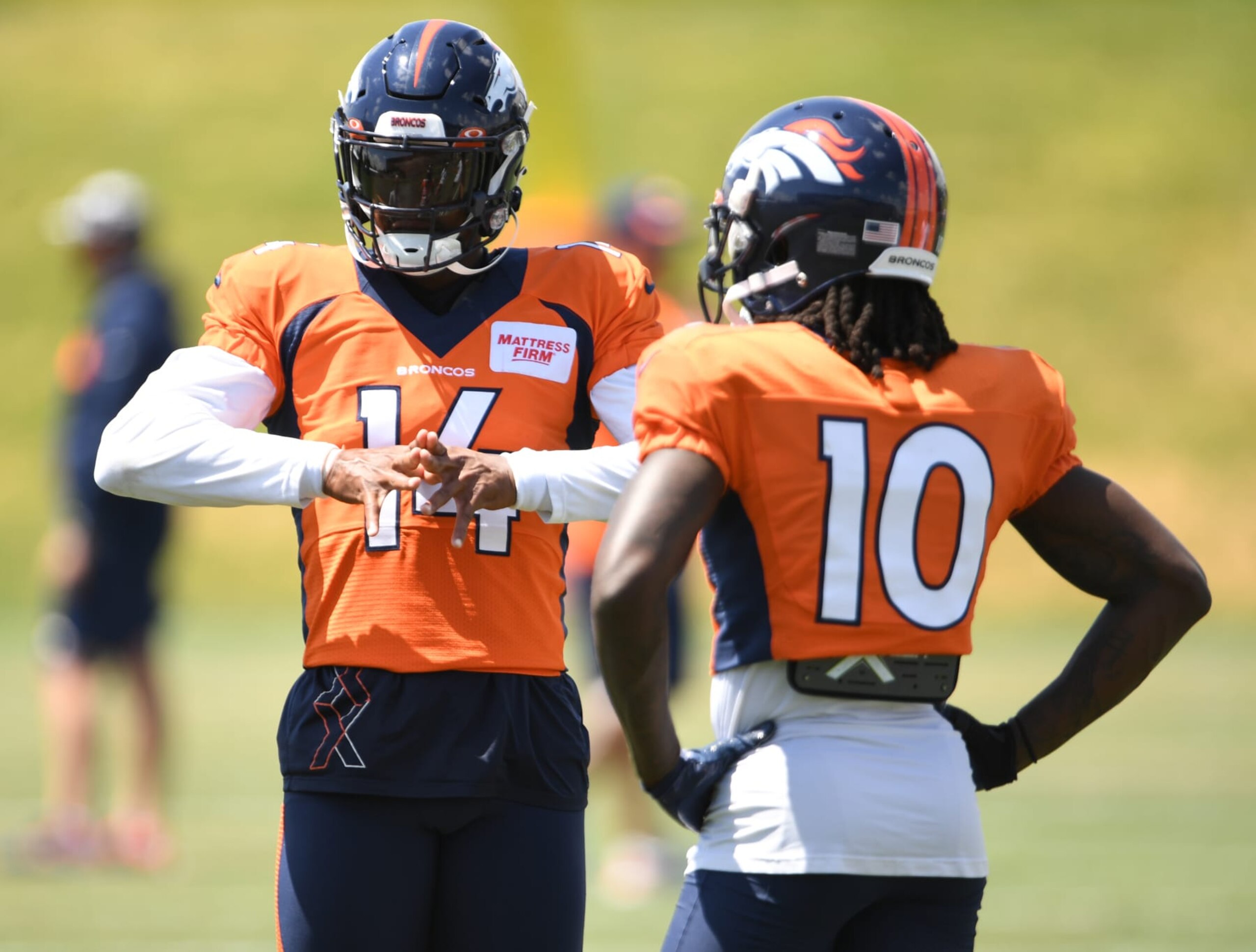 CENTENNIAL, COLORADO - AUGUST 15: Denver Broncos wide receiver Courtland Sutton (14), left, and wide receiver Jerry Jeudy (10) talk during practice, at UCHealth Training Center, on August 15, 2022 in Centennial, Colorado.(Photo by RJ Sangosti/MediaNews Group/The Denver Post via Getty Images) CENTENNIAL, COLORADO - AUGUST 15: Denver Broncos wide receiver Courtland Sutton (14), left, and wide receiver Jerry Jeudy (10) talk during practice, at UCHealth Training Center, on August 15, 2022 in Centennial, Colorado.(Photo by RJ Sangosti/MediaNews Group/The Denver Post via Getty Images)