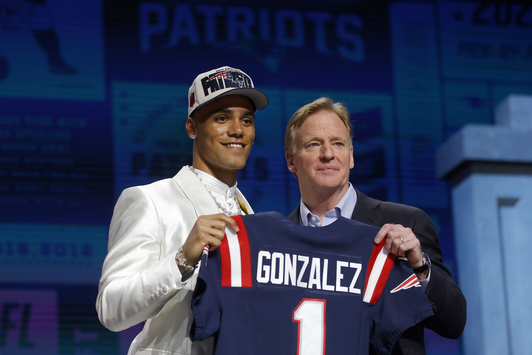 KANSAS CITY, MISSOURI - APRIL 27: (L-R) Christian Gonzalez poses with NFL Commissioner Roger Goodell after being selected 17th overall by the New England Patriots during the first round of the 2023 NFL Draft at Union Station on April 27, 2023 in Kansas City, Missouri. (Photo by David Eulitt/Getty Images)
