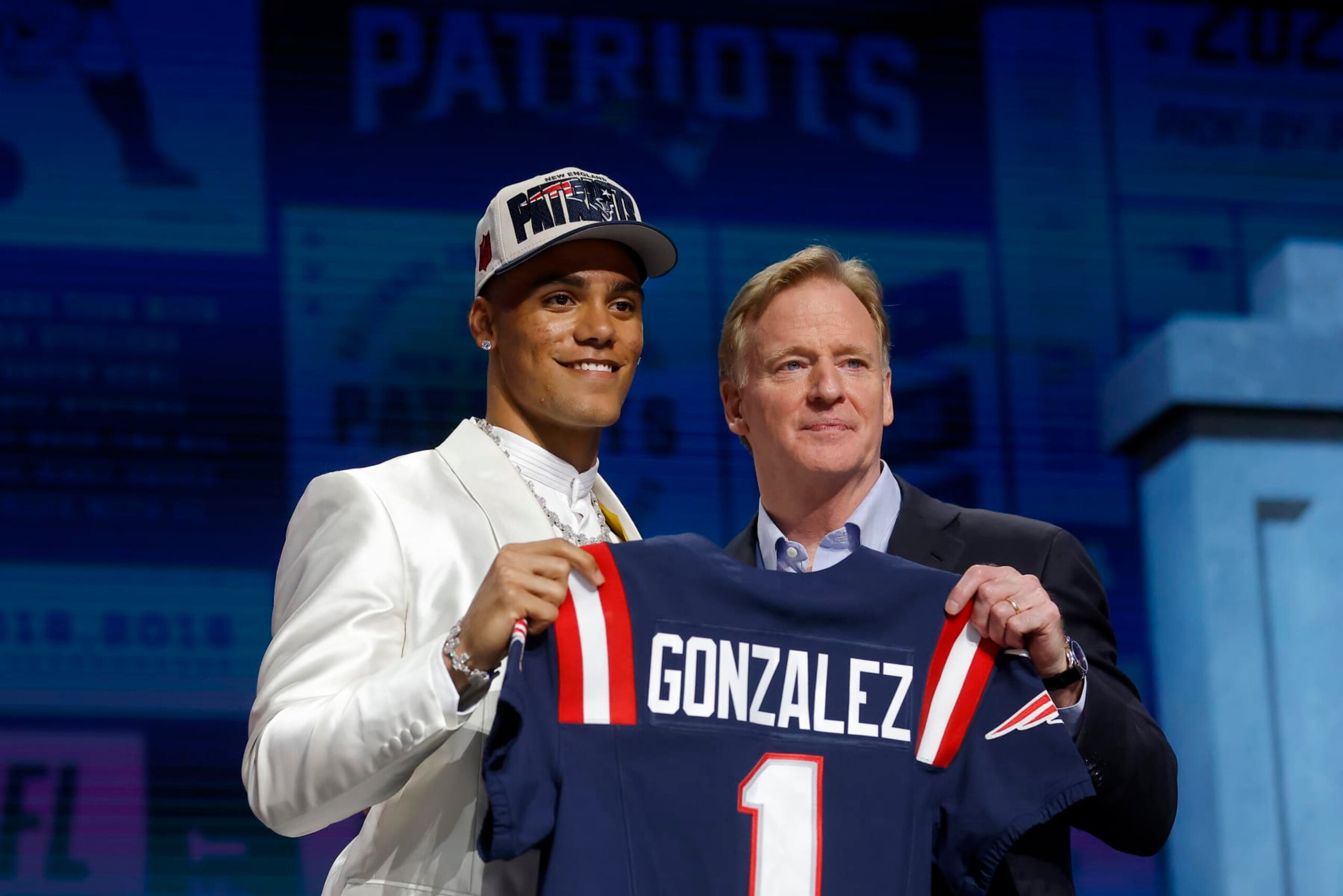 KANSAS CITY, MISSOURI - APRIL 27: (L-R) Christian Gonzalez poses with NFL Commissioner Roger Goodell after being selected 17th overall by the New England Patriots during the first round of the 2023 NFL Draft at Union Station on April 27, 2023 in Kansas City, Missouri. (Photo by David Eulitt/Getty Images)