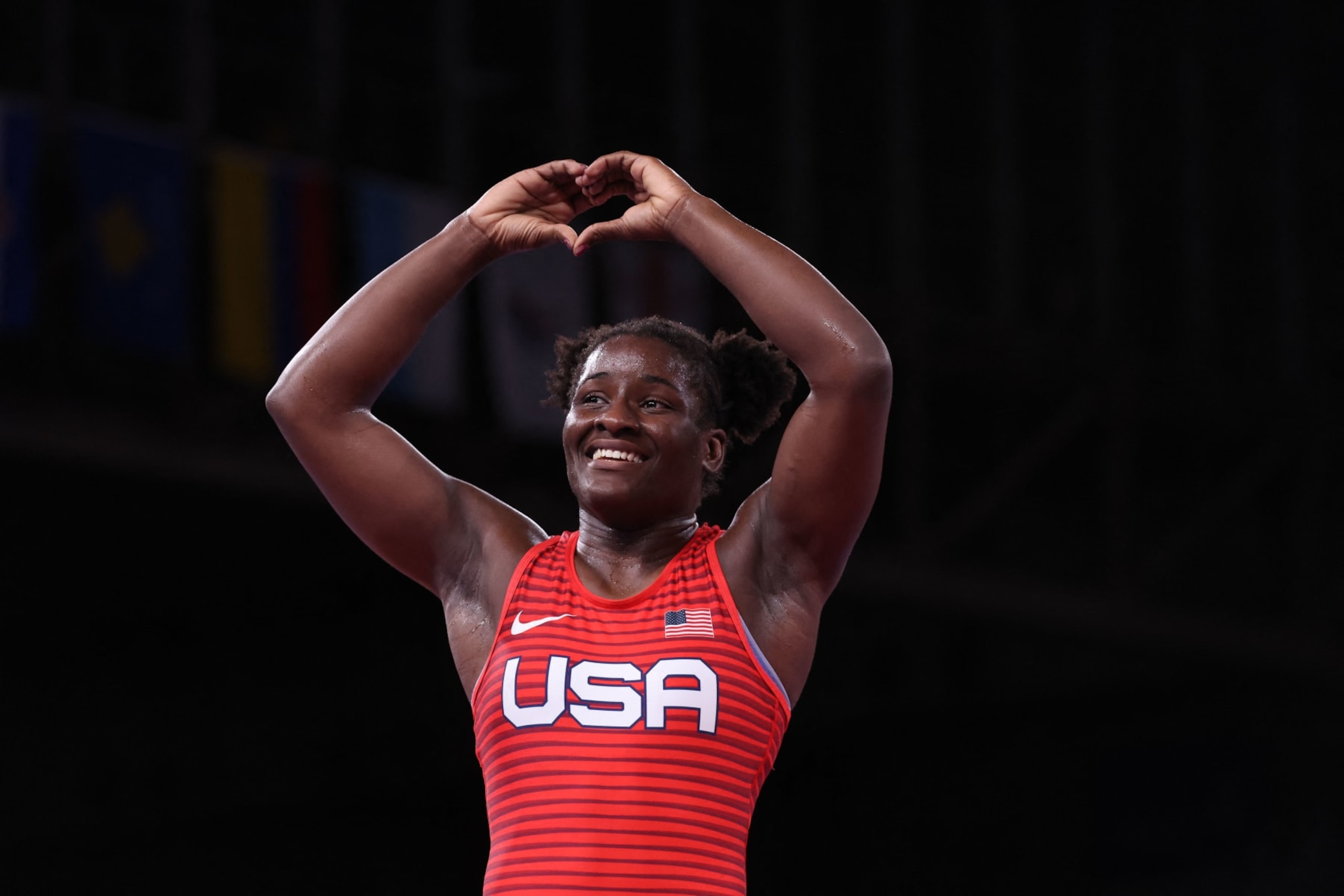 USA's Tamyra Mariama Mensah-Stock celebrate her gold medal victory against Nigeria's Blessing Oborududu in their women's freestyle 68kg wrestling final match during the Tokyo 2020 Olympic Games at the Makuhari Messe in Tokyo on August 3, 2021. (Photo by Jack GUEZ / AFP) (Photo by JACK GUEZ/AFP via Getty Images)