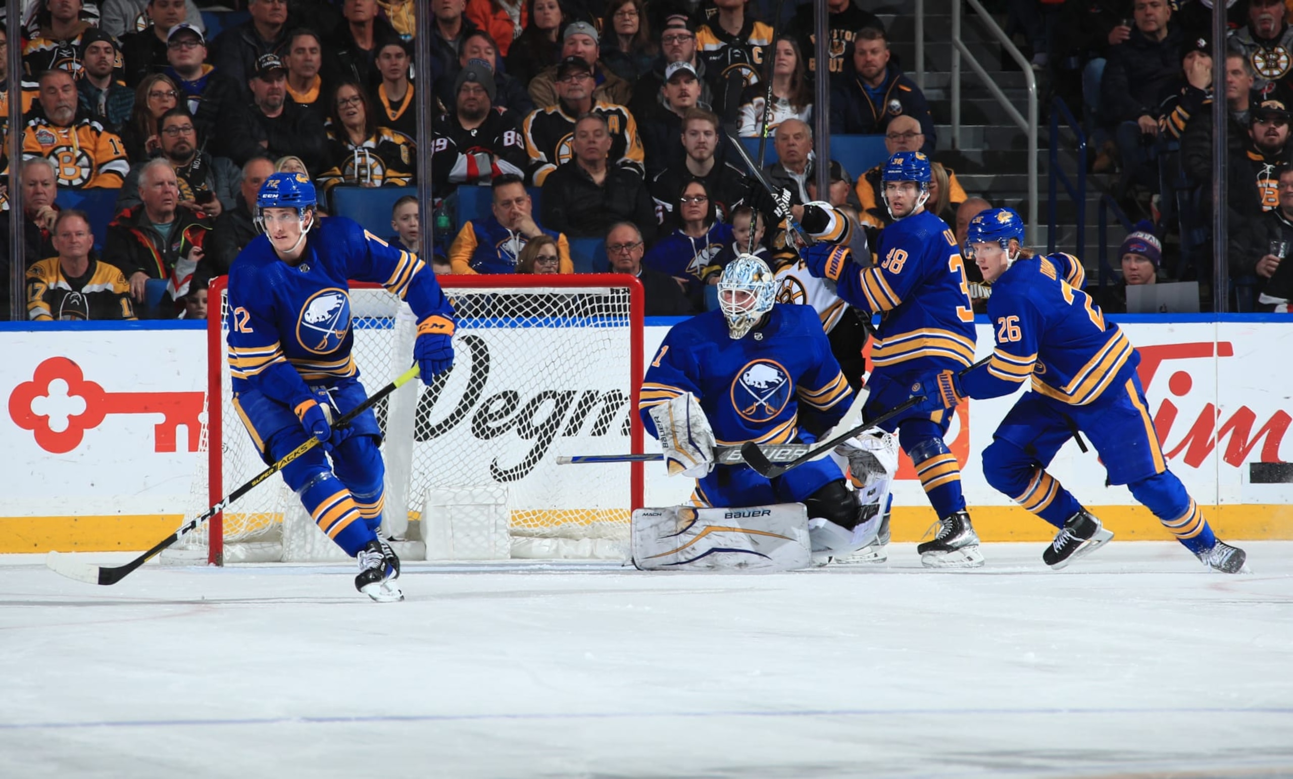 BUFFALO, NY - MARCH 19: Tage Thompson #72, Ukko-Pekka Luukkonen #1, Kale Clague #38 and Rasmus Dahlin #26 of the Buffalo Sabres defend against the Boston Bruins during an NHL game on March 19, 2023 at KeyBank Center in Buffalo, New York. (Photo by Bill Wippert/NHLI via Getty Images) BUFFALO, NY - MARCH 19: Tage Thompson #72, Ukko-Pekka Luukkonen #1, Kale Clague #38 and Rasmus Dahlin #26 of the Buffalo Sabres defend against the Boston Bruins during an NHL game on March 19, 2023 at KeyBank Center in Buffalo, New York. (Photo by Bill Wippert/NHLI via Getty Images)