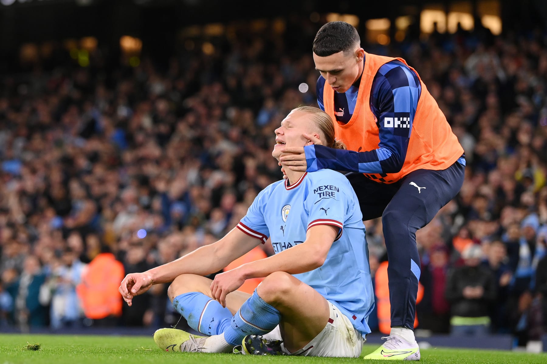MANCHESTER, ENGLAND - MAY 03: Erling Haaland celebrates with Phil Foden of Manchester City after scoring the team's second goal during the Premier League match between Manchester City and West Ham United at Etihad Stadium on May 03, 2023 in Manchester, England. (Photo by Stu Forster/Getty Images)