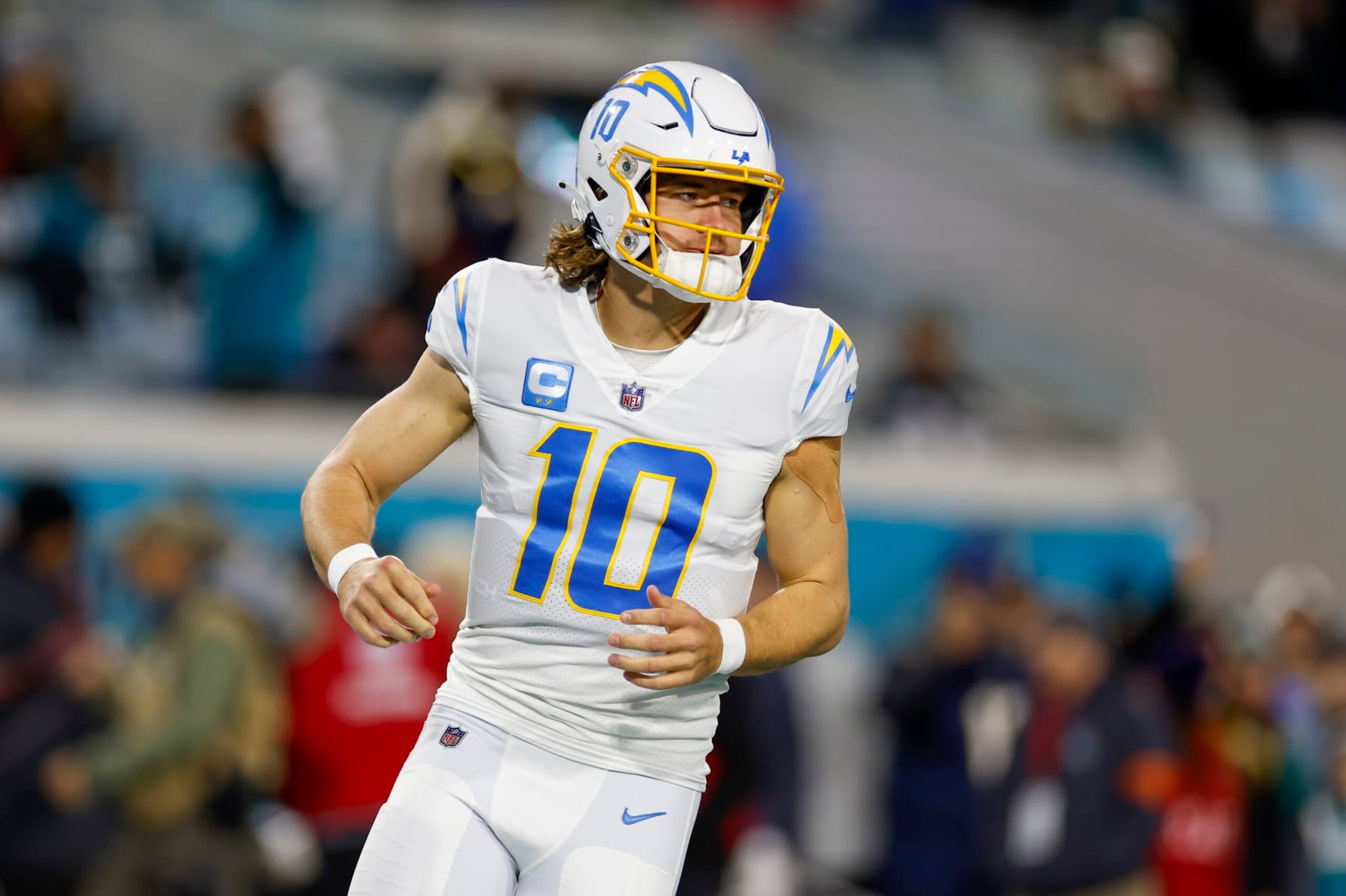 JACKSONVILLE, FL - JANUARY 14: Los Angeles Chargers quarterback Justin Herbert (10) during the game between the Los Angeles Chargers and the Jacksonville Jaguars on January 14, 2023 at TIAA Bank Field in Jacksonville, Fl. (Photo by David Rosenblum/Icon Sportswire via Getty Images)
