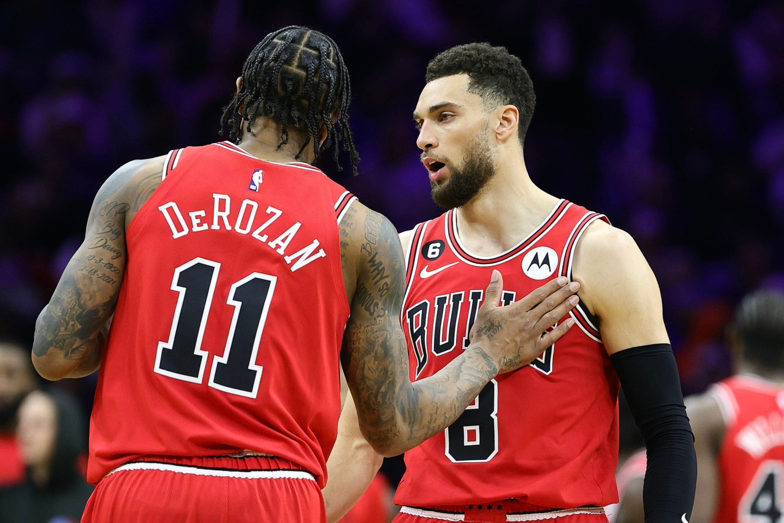 PHILADELPHIA, PENNSYLVANIA - MARCH 20: DeMar DeRozan #11 and Zach LaVine #8 of the Chicago Bulls speak during the fourth quarter against the Philadelphia 76ers at Wells Fargo Center on March 20, 2023 in Philadelphia, Pennsylvania. NOTE TO USER: User expressly acknowledges and agrees that, by downloading and or using this photograph, User is consenting to the terms and conditions of the Getty Images License Agreement. (Photo by Tim Nwachukwu/Getty Images) (Photo by Tim Nwachukwu/Getty Images)