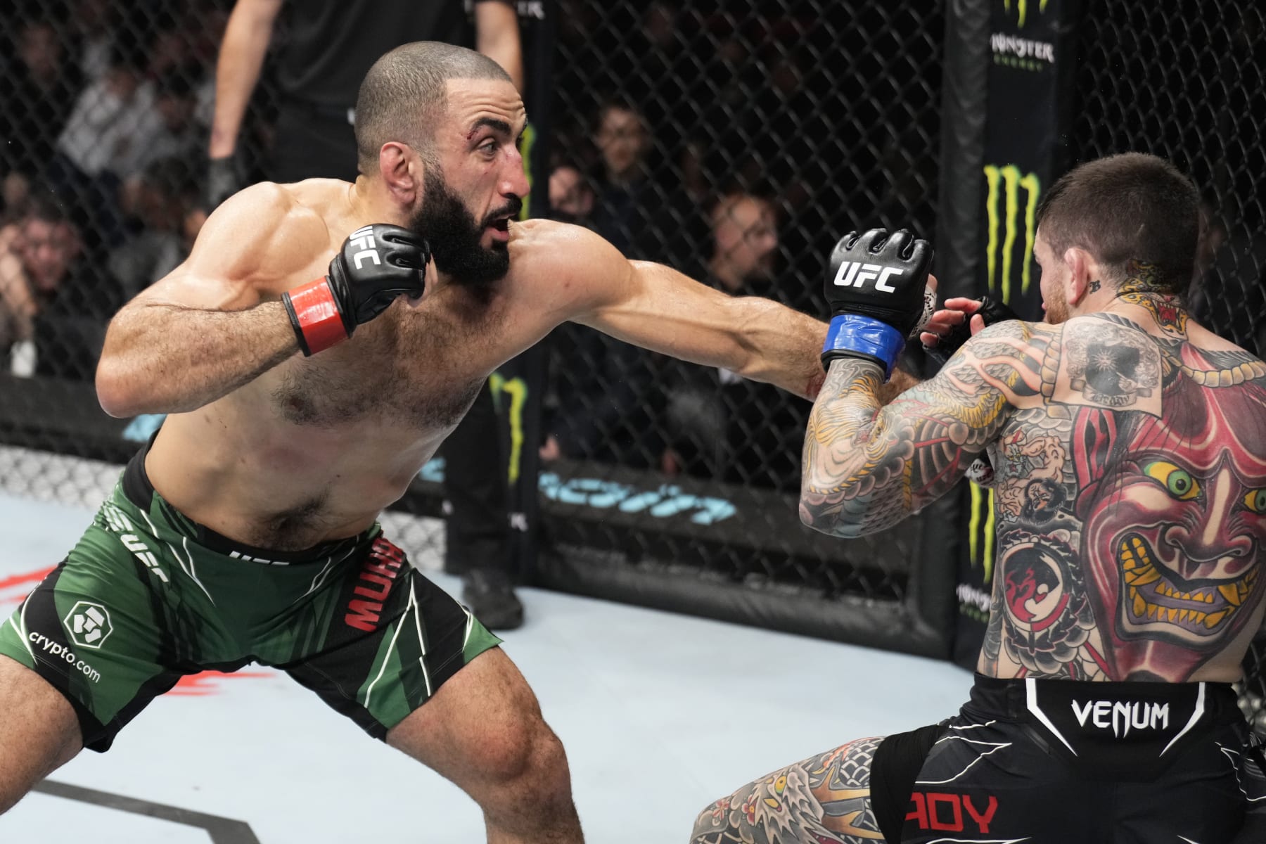 ABU DHABI, UNITED ARAB EMIRATES - OCTOBER 22: (L-R) Belal Muhammad punches Sean Brady in a welterweight fight during the UFC 280 event at Etihad Arena on October 22, 2022 in Abu Dhabi, United Arab Emirates. (Photo by Chris Unger/Zuffa LLC)