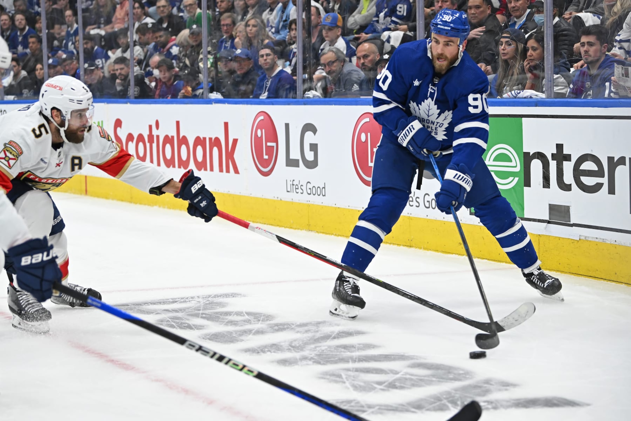 TORONTO, ON - MAY 02: Toronto Maple Leafs Center Ryan O'Reilly (90) is defended by Florida Panthers Defenceman Aaron Ekblad (5) during to Game 1 of the Eastern Conference Semi Final between the Florida Panthers and Toronto Maple Leafs on May 2, 2023 at Scotiabank Arena in Toronto, ON. (Photo by Gerry Angus/Icon Sportswire via Getty Images)