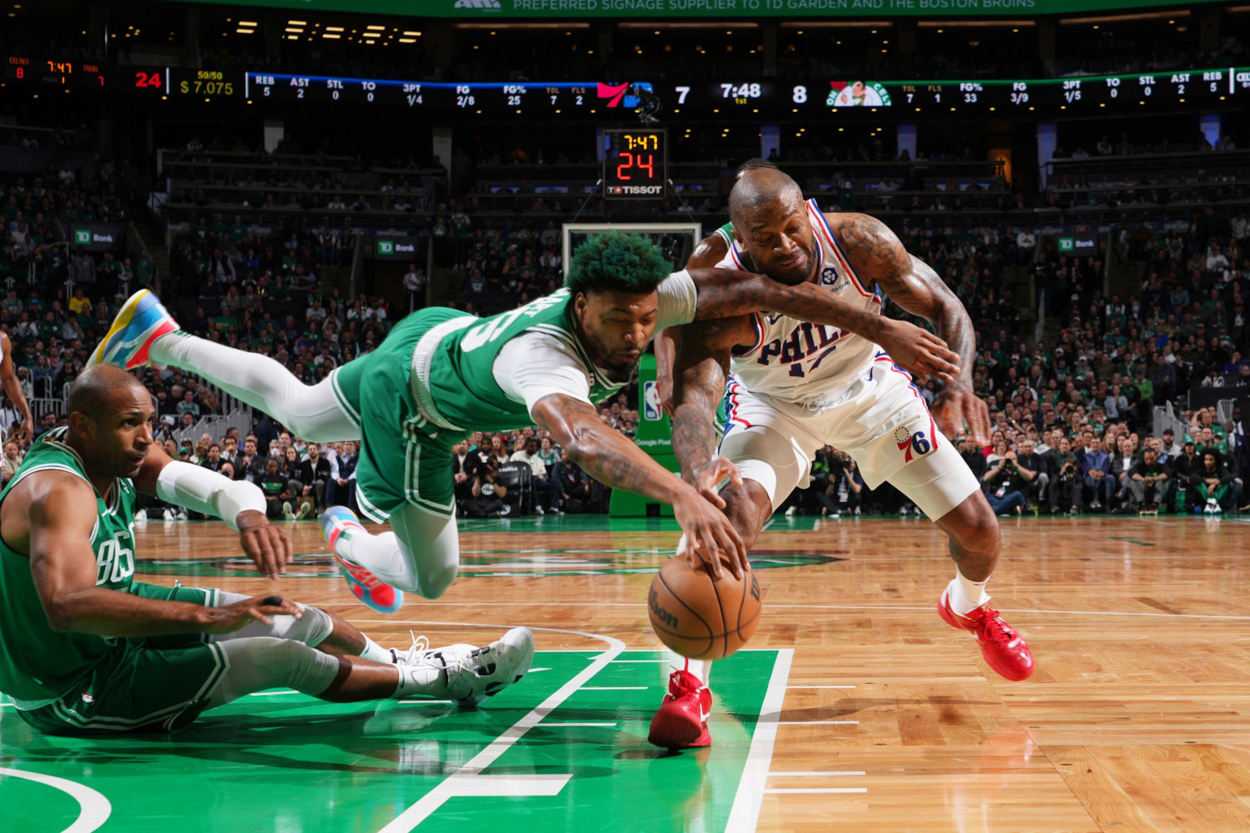 BOSTON, MA - MAY 3: Marcus Smart #36 of the Boston Celtics reaches for a loose ball during Round 2 Game 2 of the Eastern Conference Semi-Finals 2023 NBA Playoffs against the Philadelphia 76ers on May 3, 2023 at the TD Garden in Boston, Massachusetts. NOTE TO USER: User expressly acknowledges and agrees that, by downloading and or using this photograph, User is consenting to the terms and conditions of the Getty Images License Agreement. Mandatory Copyright Notice: Copyright 2023 NBAE (Photo by Jesse D. Garrabrant/NBAE via Getty Images) BOSTON, MA - MAY 3: Marcus Smart #36 of the Boston Celtics reaches for a loose ball during Round 2 Game 2 of the Eastern Conference Semi-Finals 2023 NBA Playoffs against the Philadelphia 76ers on May 3, 2023 at the TD Garden in Boston, Massachusetts. NOTE TO USER: User expressly acknowledges and agrees that, by downloading and or using this photograph, User is consenting to the terms and conditions of the Getty Images License Agreement. Mandatory Copyright Notice: Copyright 2023 NBAE (Photo by Jesse D. Garrabrant/NBAE via Getty Images)