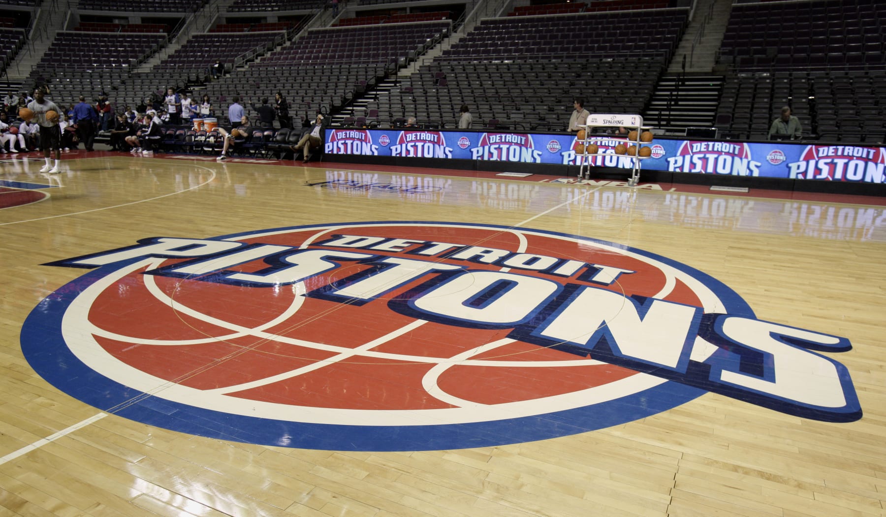 The Detroit Pistons logo on the basketball court before basketball game between the Pistons and the Milwaukee Bucks at The Palace Friday, April 8, 2011, in Auburn Hills, Mich. The Pistons announced Friday that billionaire California investor Tom Gores has agreed to buy the struggling NBA franchise. (AP Photo/Duane Burleson)