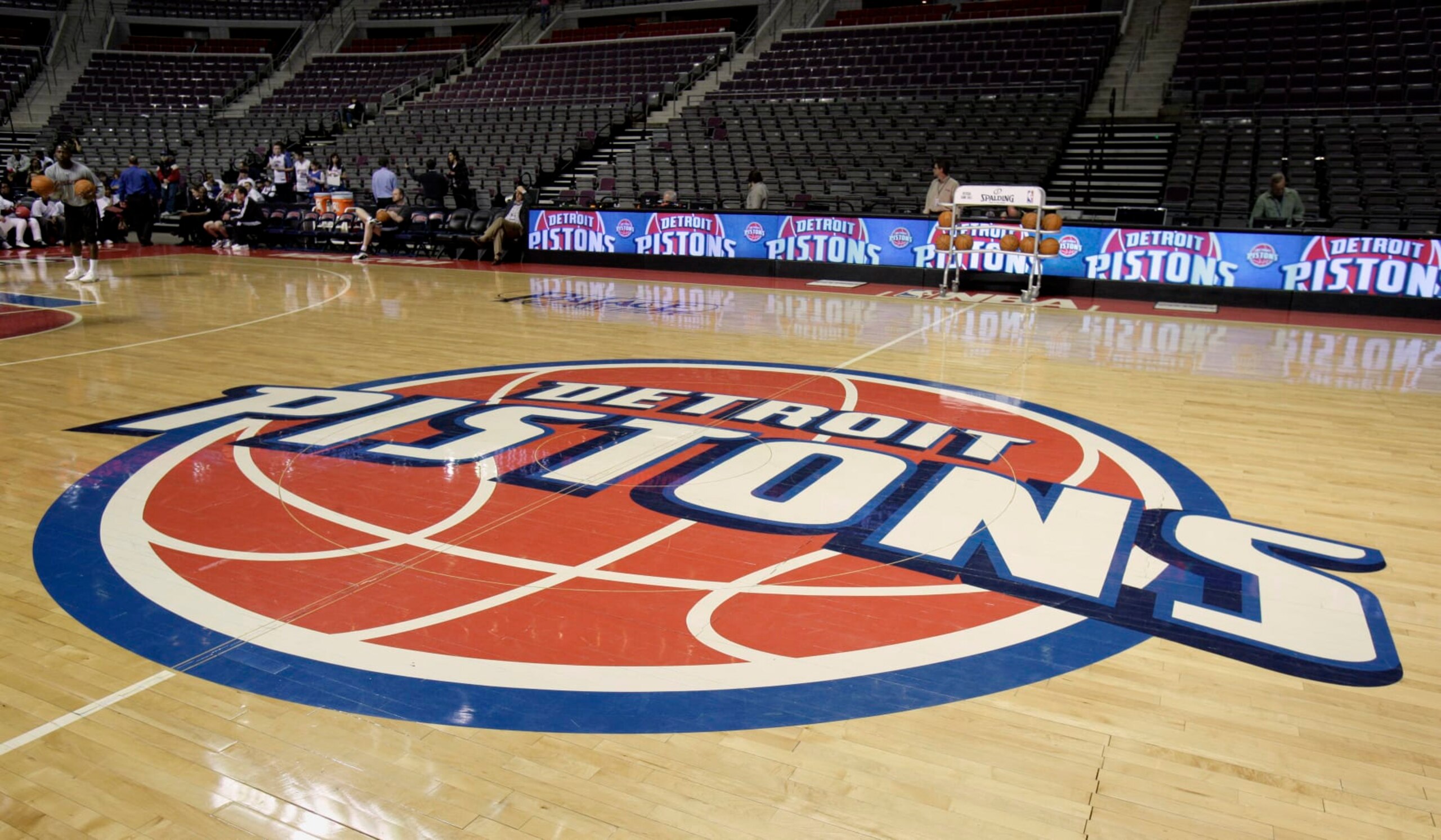 The Detroit Pistons logo on the basketball court before basketball game between the Pistons and the Milwaukee Bucks at The Palace Friday, April 8, 2011, in Auburn Hills, Mich. The Pistons announced Friday that billionaire California investor Tom Gores has agreed to buy the struggling NBA franchise. (AP Photo/Duane Burleson)