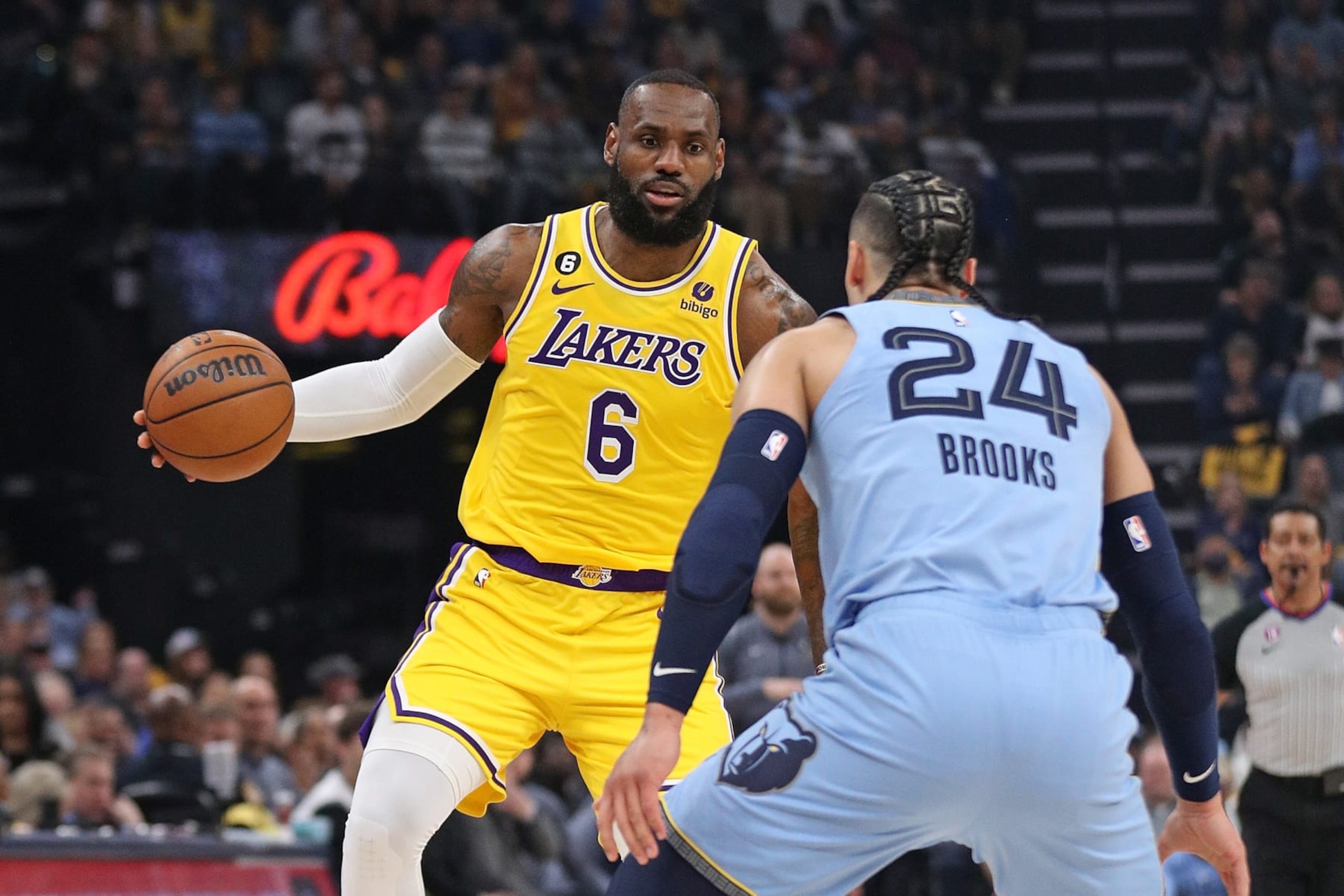 MEMPHIS, TENNESSEE - APRIL 26: LeBron James #6 of the Los Angeles Lakers handles the ball against Dillon Brooks #24 of the Memphis Grizzlies during Game Five of the Western Conference First Round Playoffs at FedExForum on April 26, 2023 in Memphis, Tennessee. NOTE TO USER: User expressly acknowledges and agrees that, by downloading and or using this photograph, User is consenting to the terms and conditions of the Getty Images License Agreement. (Photo by Justin Ford/Getty Images) MEMPHIS, TENNESSEE - APRIL 26: LeBron James #6 of the Los Angeles Lakers handles the ball against Dillon Brooks #24 of the Memphis Grizzlies during Game Five of the Western Conference First Round Playoffs at FedExForum on April 26, 2023 in Memphis, Tennessee. NOTE TO USER: User expressly acknowledges and agrees that, by downloading and or using this photograph, User is consenting to the terms and conditions of the Getty Images License Agreement. (Photo by Justin Ford/Getty Images)