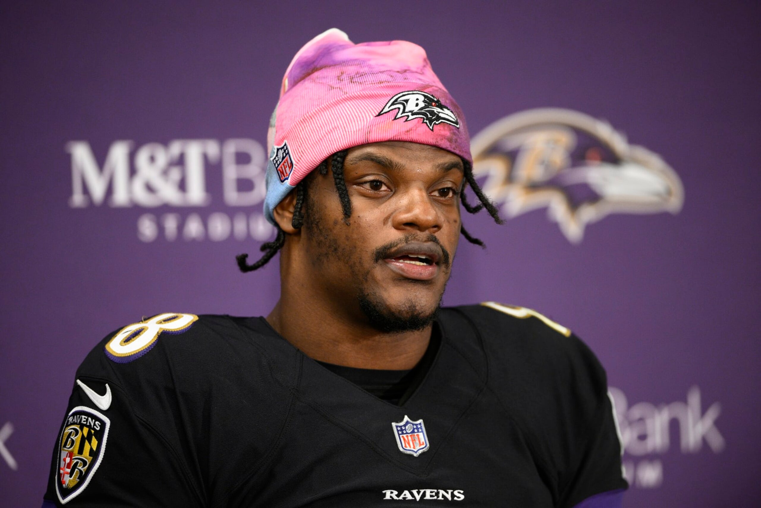 FILE - Baltimore Ravens quarterback Lamar Jackson (8) speaks to the media at a press conference after an NFL football game against the Cincinnati Bengals, Sunday, Oct. 9, 2022, in Baltimore. Lamar Jackson remained absent Wednesday, Jan. 4, 2023, from the portion of practice open to reporters. Baltimore's star quarterback hasn't practiced since injuring his knee Dec. 4 in the Ravens' victory over Denver. (AP Photo/Nick Wass, File)