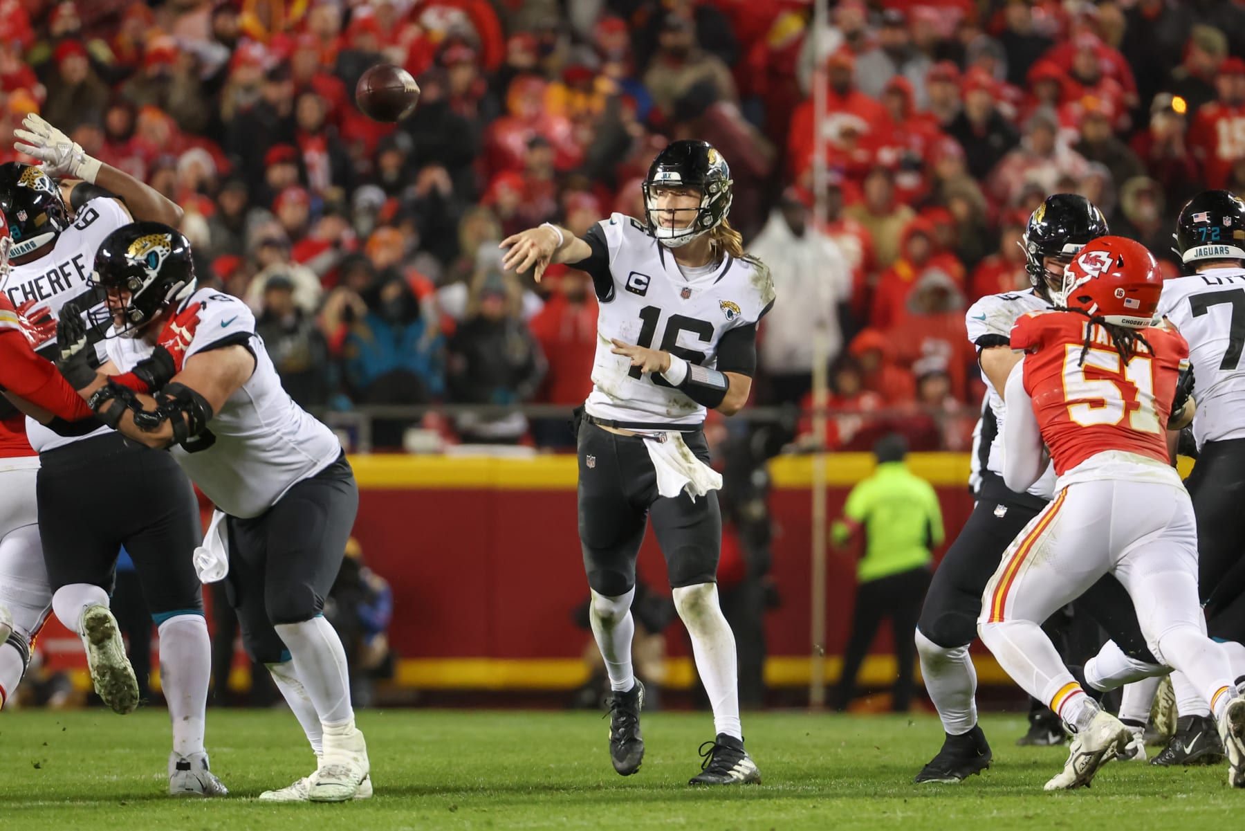 KANSAS CITY, MO - JANUARY 21: Jacksonville Jaguars quarterback Trevor Lawrence (16) throws from the pocket in the fourth quarter of an AFC divisional playoff game between the Jacksonville Jaguars and Kansas City Chiefs on January 21, 2023 at GEHA Field at Arrowhead Stadium in Kansas City, MO. (Photo by Scott Winters/Icon Sportswire via Getty Images)