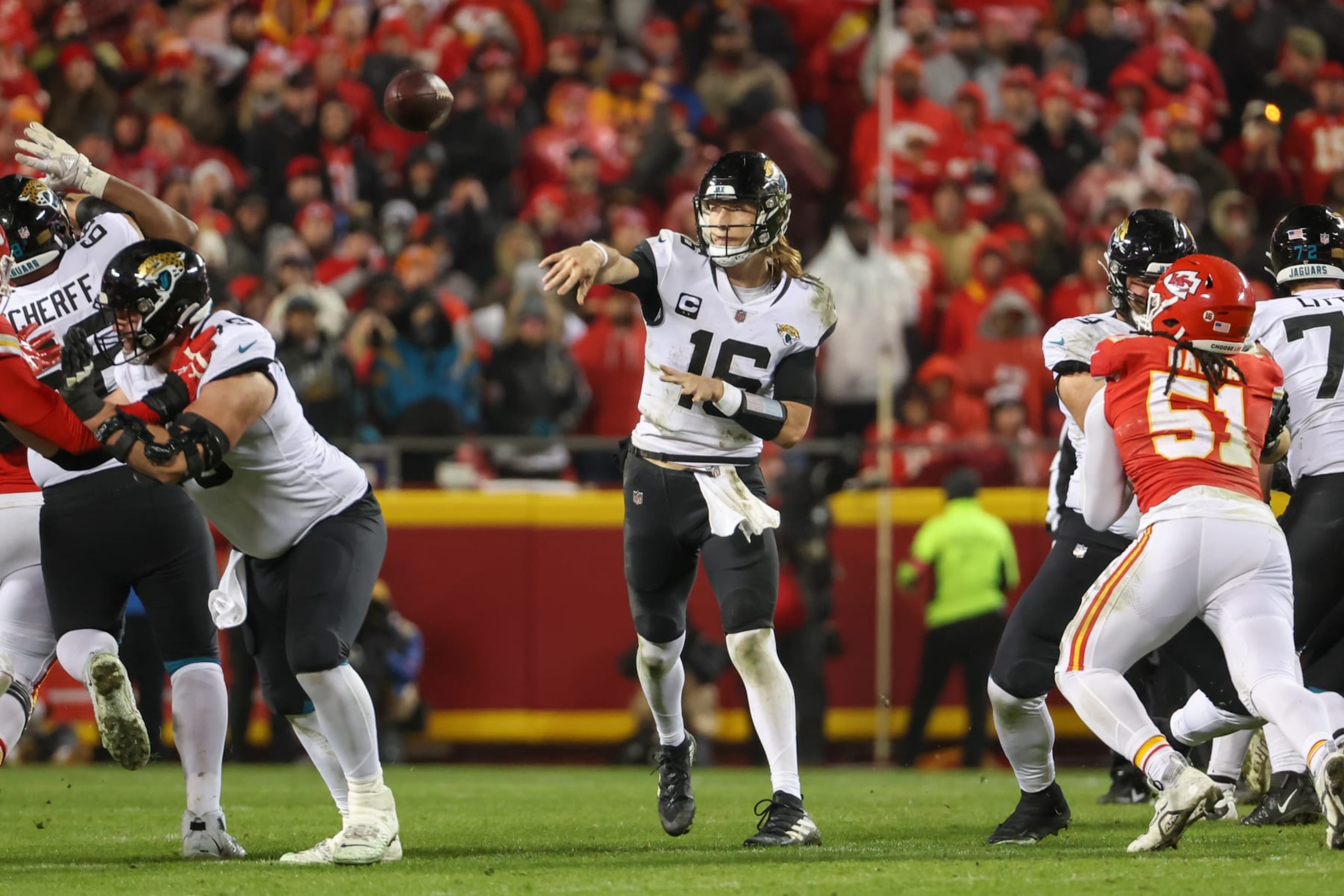KANSAS CITY, MO - JANUARY 21: Jacksonville Jaguars quarterback Trevor Lawrence (16) throws from the pocket in the fourth quarter of an AFC divisional playoff game between the Jacksonville Jaguars and Kansas City Chiefs on January 21, 2023 at GEHA Field at Arrowhead Stadium in Kansas City, MO. (Photo by Scott Winters/Icon Sportswire via Getty Images)