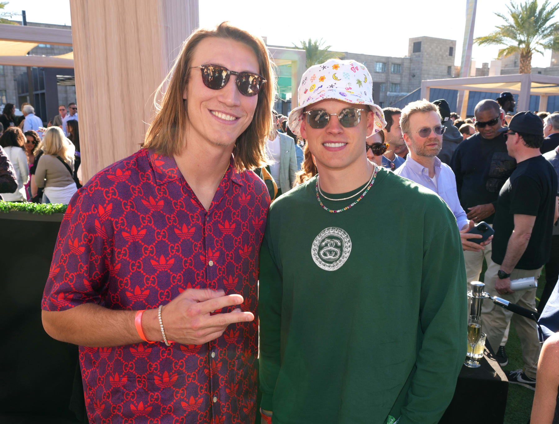 PHOENIX, ARIZONA - FEBRUARY 11: (L-R) Trevor Lawrence and Joe Burrow attend Michael Rubin's 2023 Fanatics Super Bowl Party at the Arizona Biltmore on February 11, 2023 in Phoenix, Arizona. (Photo by Kevin Mazur/Getty Images for Fanatics)