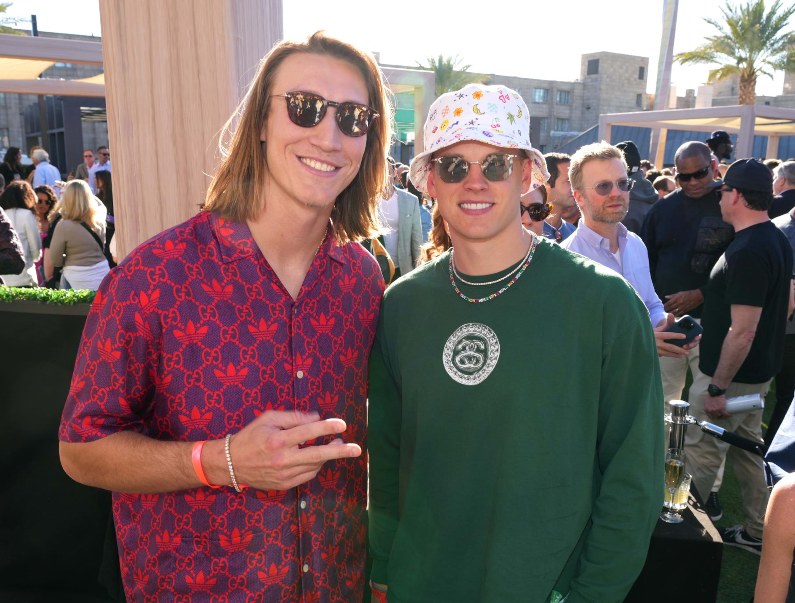 PHOENIX, ARIZONA - FEBRUARY 11: (L-R) Trevor Lawrence and Joe Burrow attend Michael Rubin's 2023 Fanatics Super Bowl Party at the Arizona Biltmore on February 11, 2023 in Phoenix, Arizona. (Photo by Kevin Mazur/Getty Images for Fanatics)