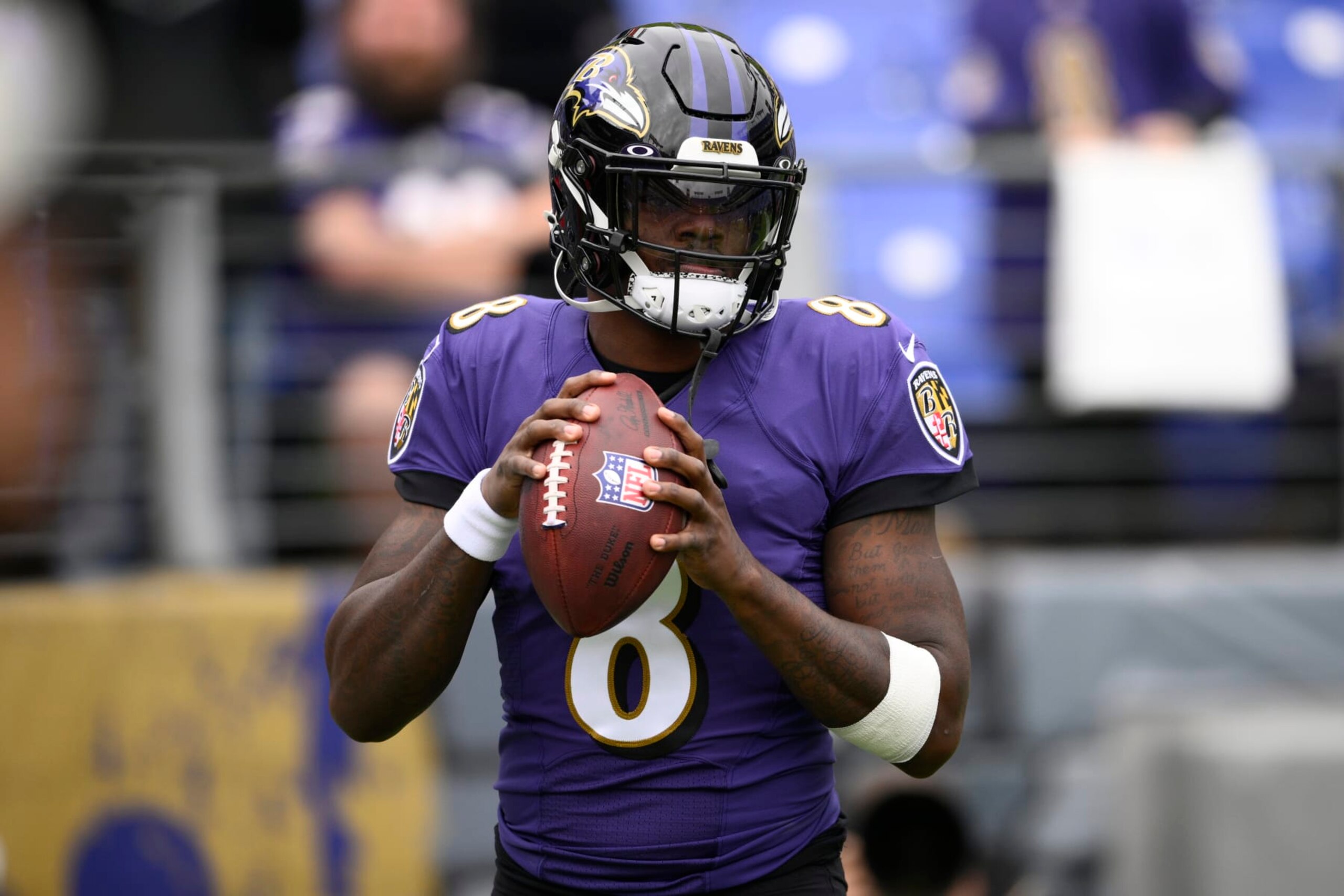 Baltimore Ravens quarterback Lamar Jackson (8) warms up before an NFL football game against the Cleveland Browns, Sunday, Oct. 23, 2022, in Baltimore. (AP Photo/Nick Wass)