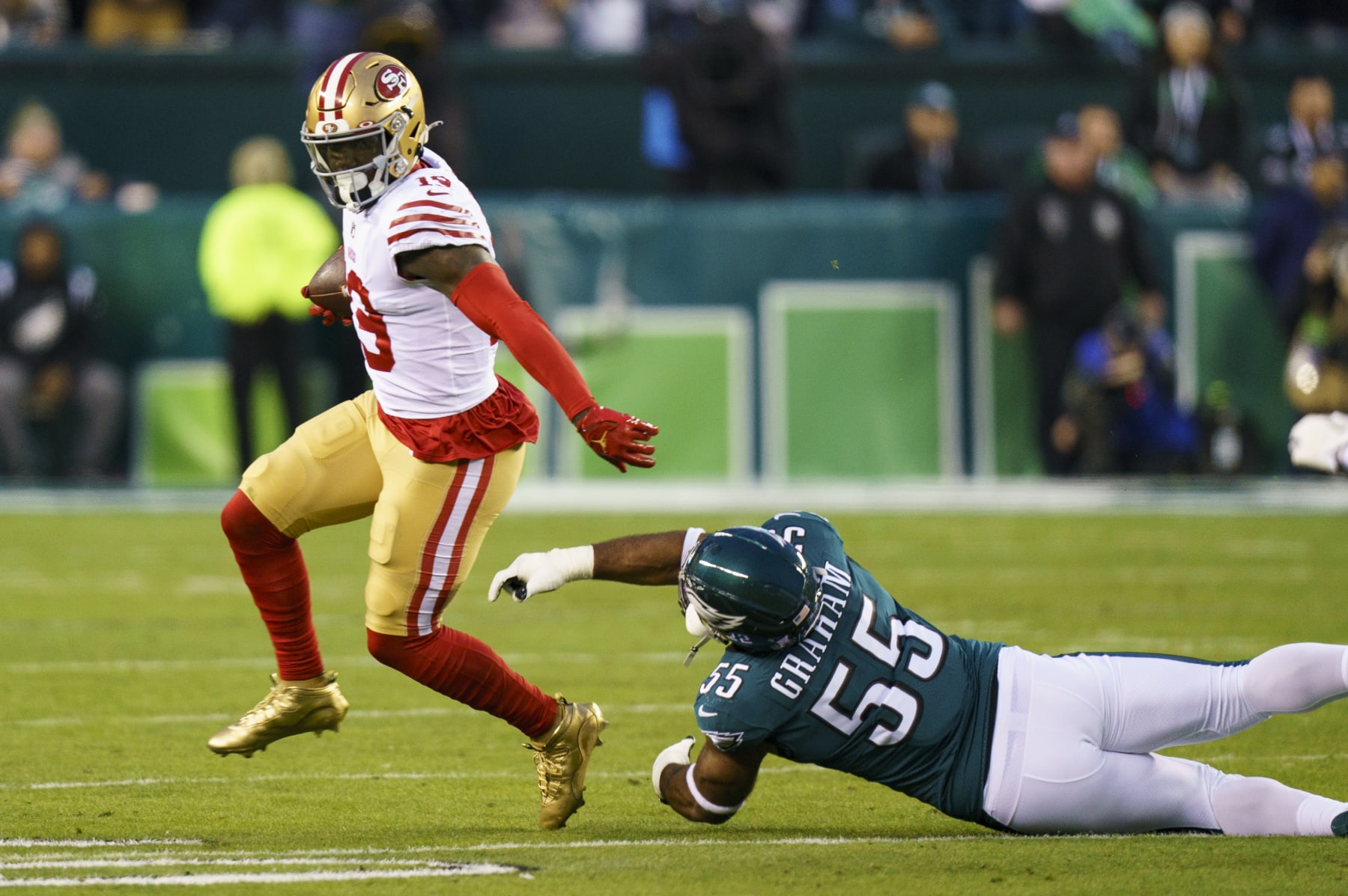 San Francisco 49ers wide receiver Deebo Samuel (19) in action against Philadelphia Eagles defensive end Brandon Graham (55) during the NFC Championship NFL football game, Sunday, Jan. 29, 2023, in Philadelphia. (AP Photo/Chris Szagola)