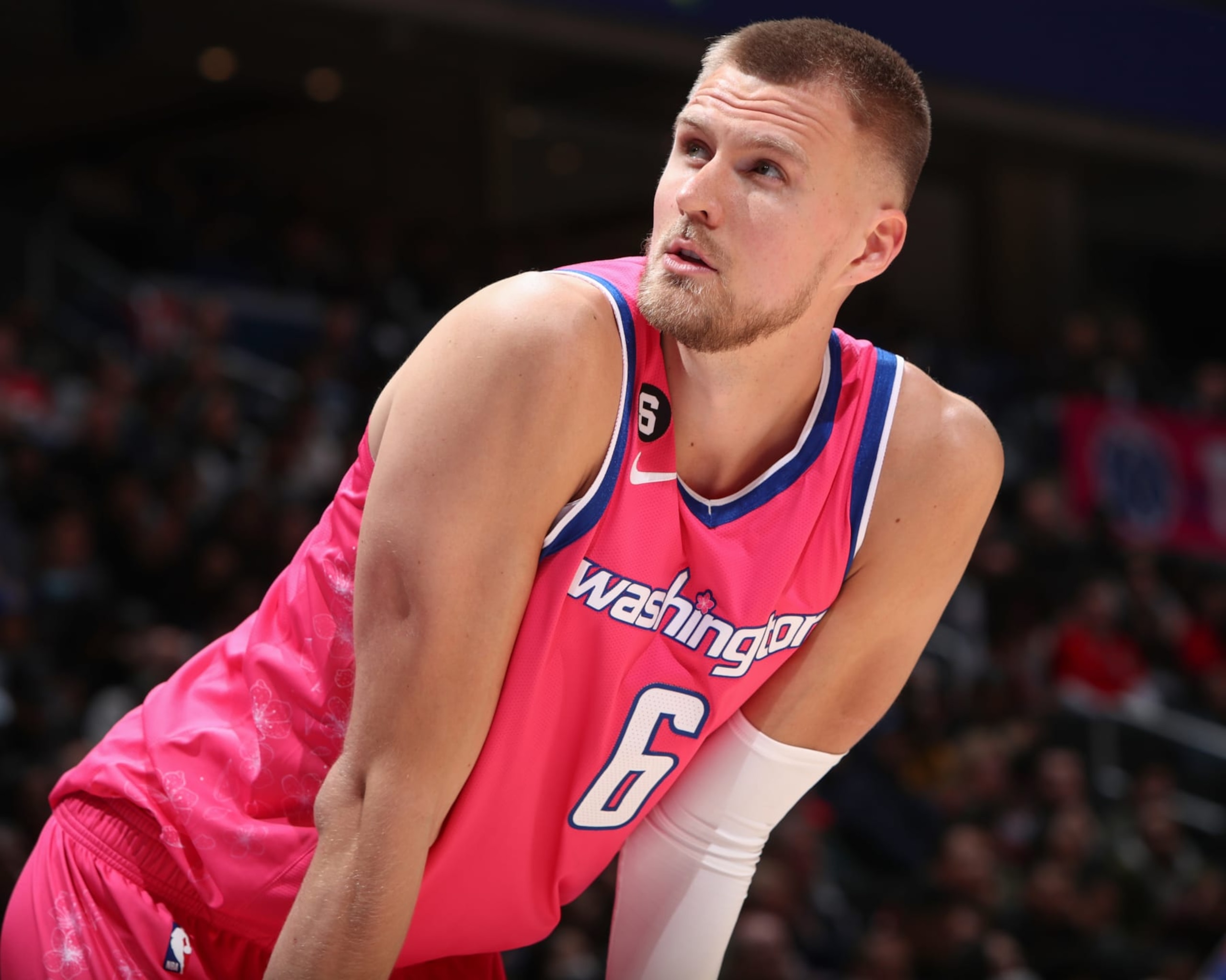 WASHINGTON, DC -ย MARCH 22: Kristaps Porzingis #6 of the Washington Wizards looks on during the game on March 22, 2023 at Capital One Arena in Washington, DC. NOTE TO USER: User expressly acknowledges and agrees that, by downloading and or using this Photograph, user is consenting to the terms and conditions of the Getty Images License Agreement. Mandatory Copyright Notice: Copyright 2023 NBAE (Photo by Kenny Giarla/NBAE via Getty Images) WASHINGTON, DC -ย MARCH 22: Kristaps Porzingis #6 of the Washington Wizards looks on during the game on March 22, 2023 at Capital One Arena in Washington, DC. NOTE TO USER: User expressly acknowledges and agrees that, by downloading and or using this Photograph, user is consenting to the terms and conditions of the Getty Images License Agreement. Mandatory Copyright Notice: Copyright 2023 NBAE (Photo by Kenny Giarla/NBAE via Getty Images)