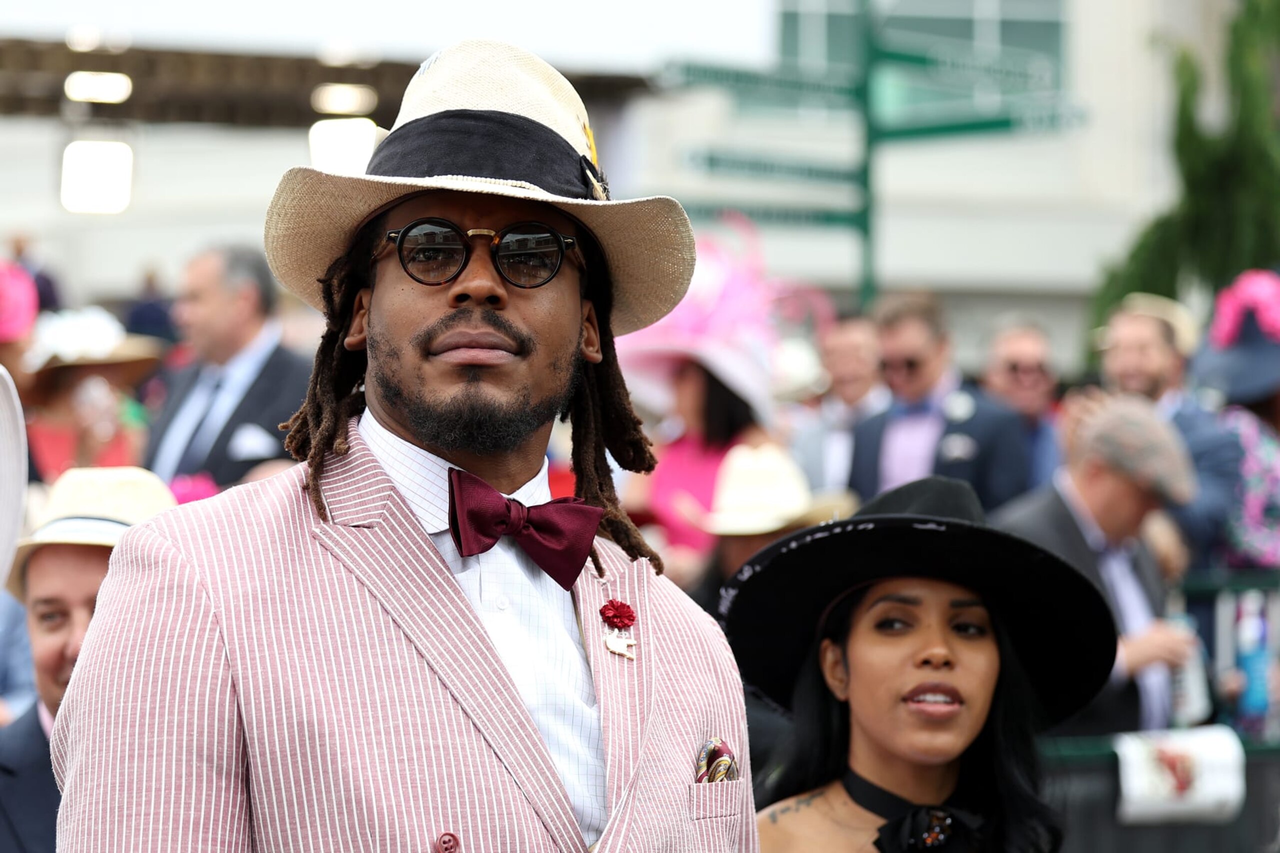 LOUISVILLE, KENTUCKY - MAY 07: NFL player Cam Newton watches an undercard race before the running of the 148th Kentucky Derby at Churchill Downs on May 07, 2022 in Louisville, Kentucky. (Photo by Gunnar Word/Getty Images)