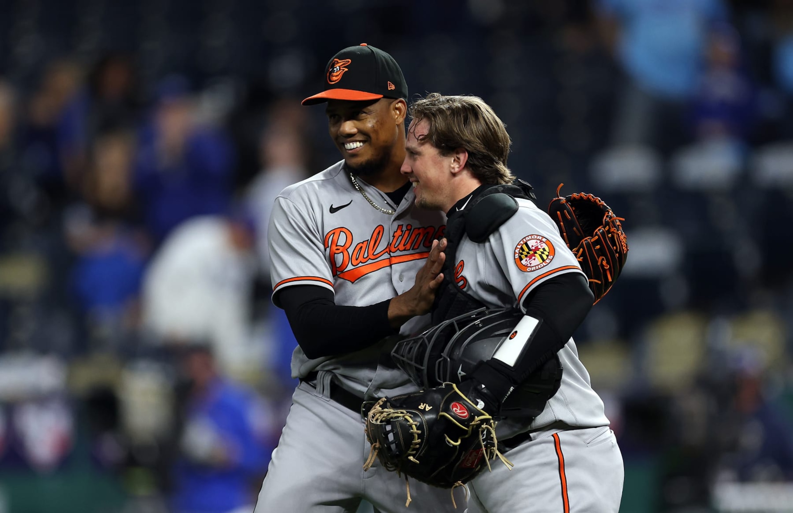 Yennier Canó (L) and Adley Rutschman (R)
