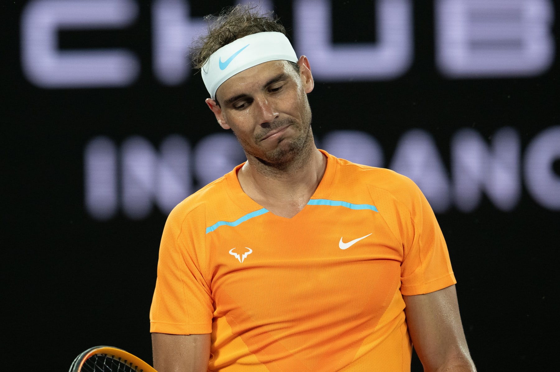 MELBOURNE, AUSTRALIA - JANUARY 18: Rafael Nadal of Spain reacts in their round two singles match against Mackenzie McDonald of the United States during day three of the 2023 Australian Open at Melbourne Park on January 18, 2023 in Melbourne, Australia. (Photo by Will Murray/Getty Images)