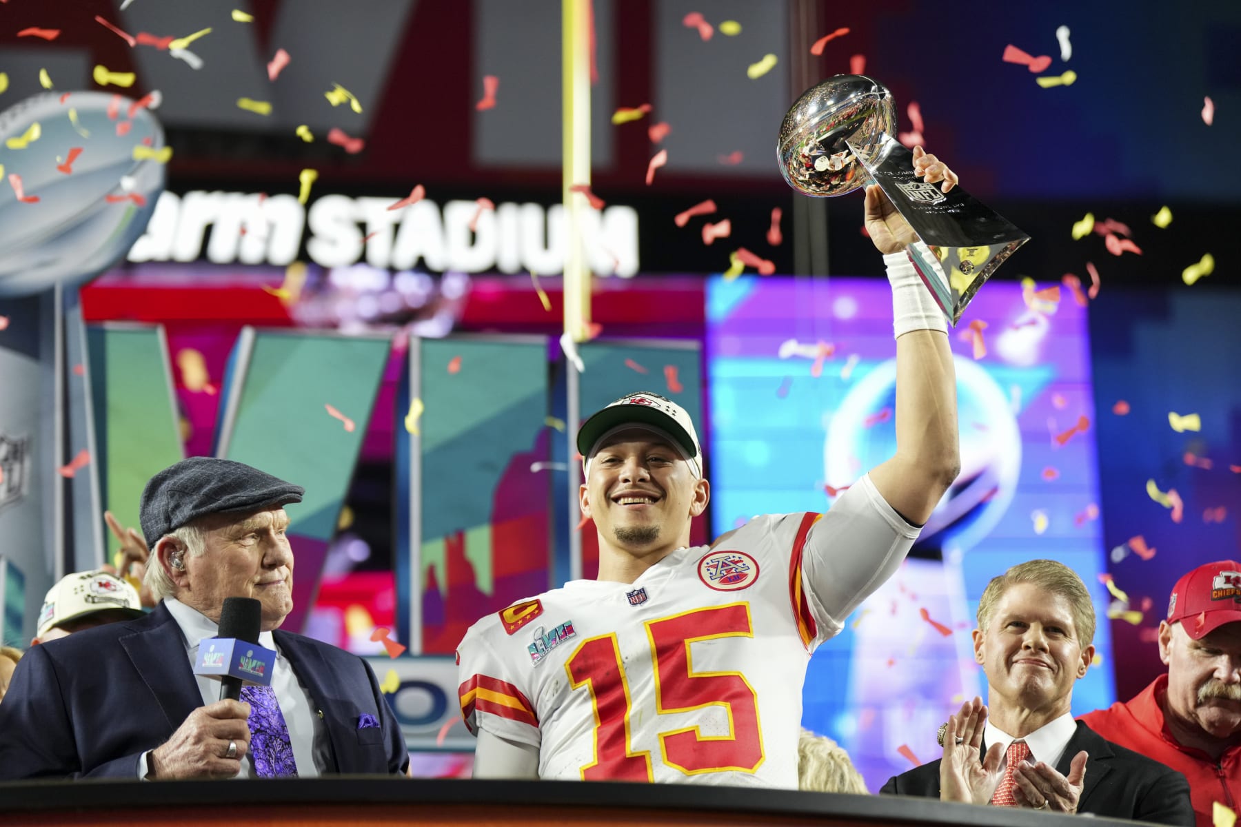 GLENDALE, AZ - FEBRUARY 12: Patrick Mahomes #15 of the Kansas City Chiefs hoists the Lombardi Trophy after Super Bowl LVII against the Philadelphia Eagles at State Farm Stadium on February 12, 2023 in Glendale, Arizona. The Chiefs defeated the Eagles 38-35. (Photo by Cooper Neill/Getty Images)