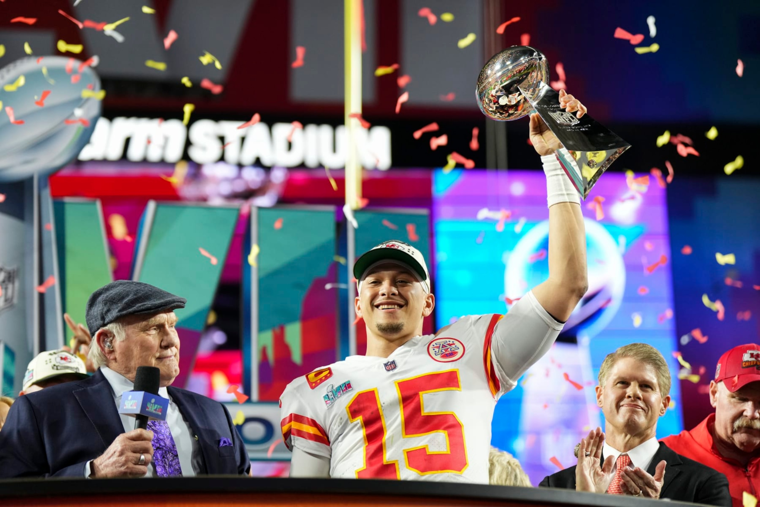 GLENDALE, AZ - FEBRUARY 12: Patrick Mahomes #15 of the Kansas City Chiefs hoists the Lombardi Trophy after Super Bowl LVII against the Philadelphia Eagles at State Farm Stadium on February 12, 2023 in Glendale, Arizona. The Chiefs defeated the Eagles 38-35. (Photo by Cooper Neill/Getty Images)
