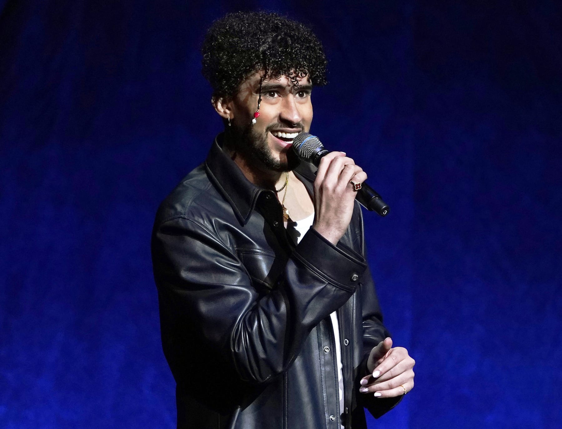 FILE - Bad Bunny speaks at the Sony Pictures Entertainment presentation at CinemaCon 2022 in Las Vegas on April 25, 2022. The Puerto Rican superstar was named Artist of the Year, thanks to his latest album, “Un Verano Sin Ti,” becoming Apple Music’s most streamed album of 2022 and the biggest Latin album of all time. (AP Photo/Chris Pizzello, File)