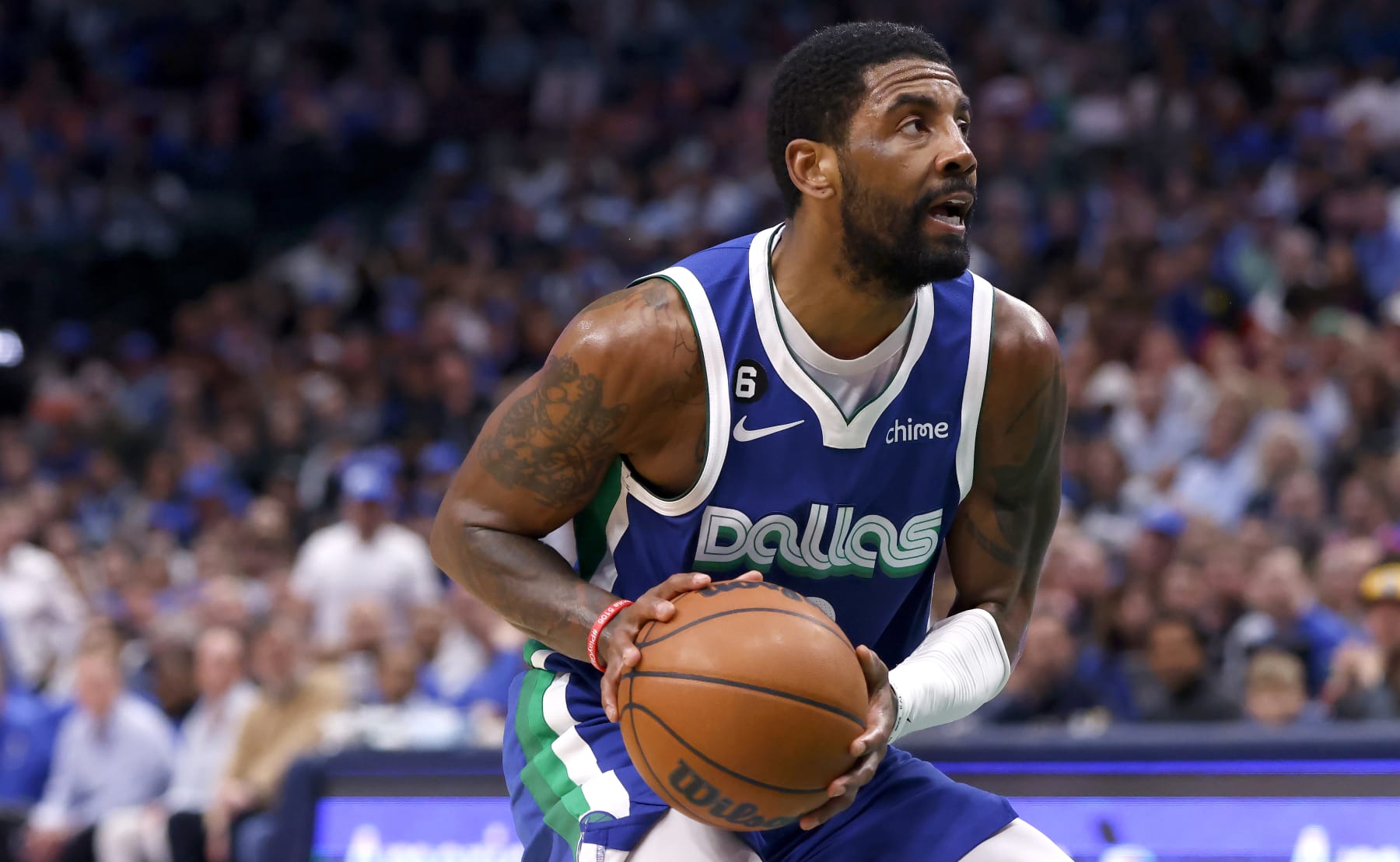 DALLAS, TX - APRIL 5: Kyrie Irving #2 of the Dallas Mavericks handles the ball against the Sacramento Kings in the second half at American Airlines Center on April 5, 2023 in Dallas, Texas. The Mavericks won 123-119. NOTE TO USER: User expressly acknowledges and agrees that, by downloading and or using this photograph, User is consenting to the terms and conditions of the Getty Images License Agreement. (Photo by Ron Jenkins/Getty Images)