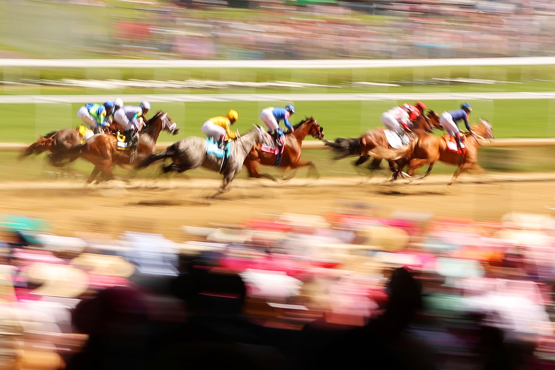 LOUISVILLE, KENTUCKY - MAY 05: A general view as horses runs by during an race ahead of the 149th running of the Kentucky Derby at Churchill Downs on May 05, 2023 in Louisville, Kentucky. (Photo by Michael Reaves/Getty Images)